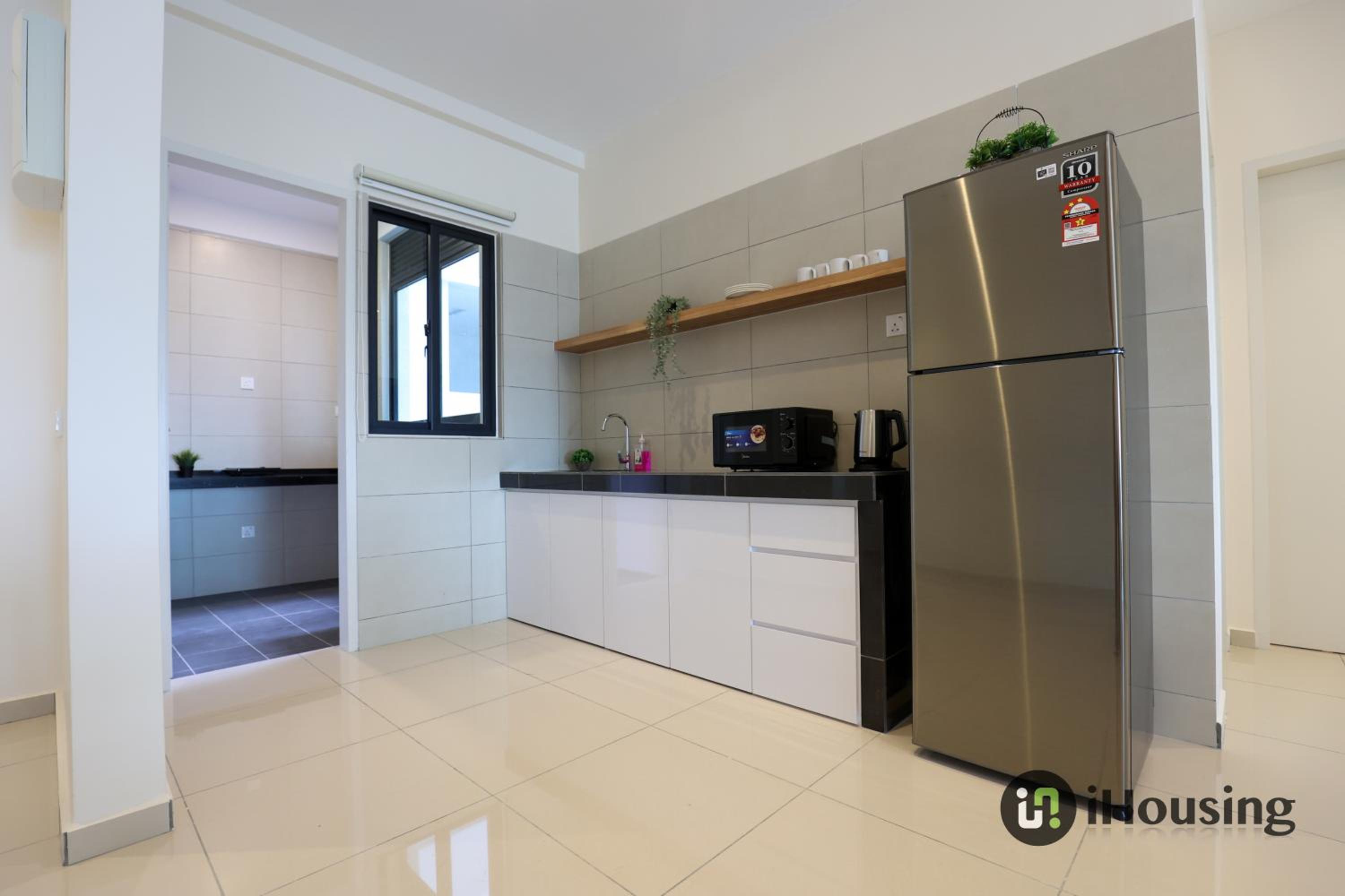 Three-Bedroom Apartment - Photo 11