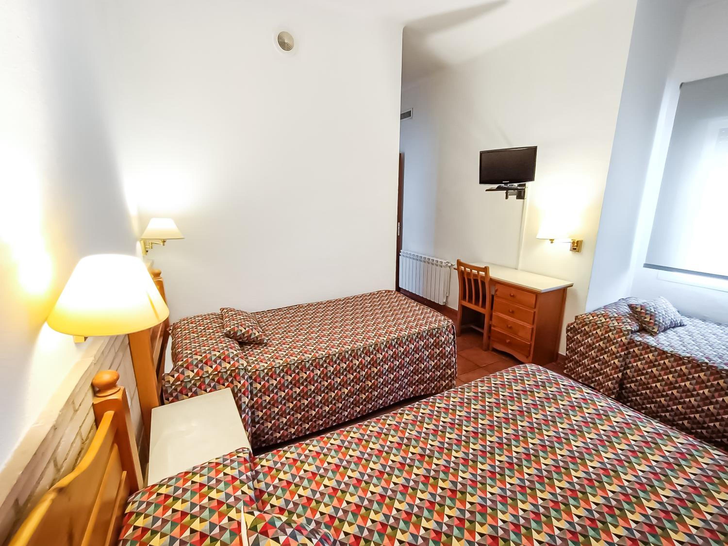 Triple Room - Photo 1