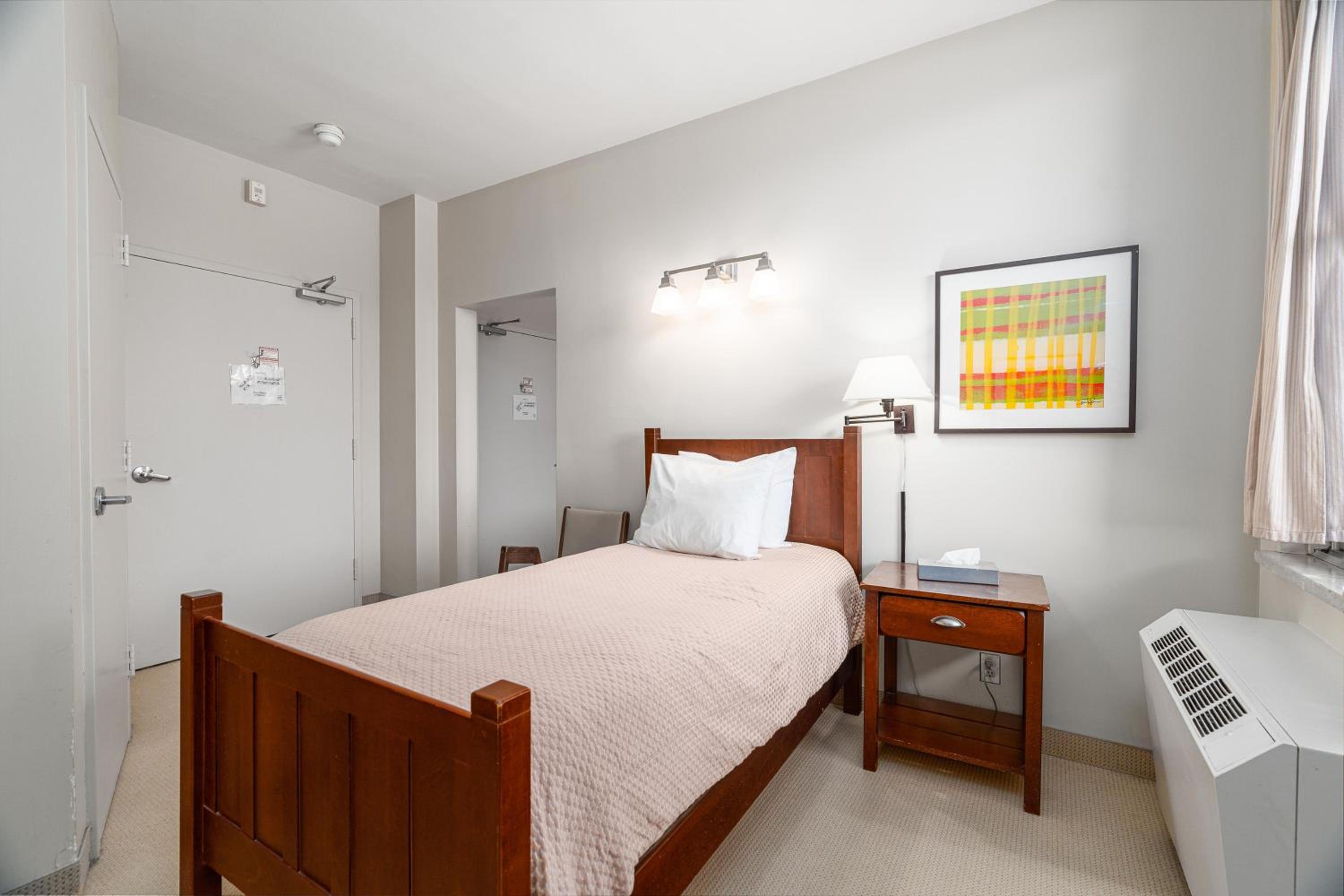 Queen Bed and Single Bed with Half Washroom