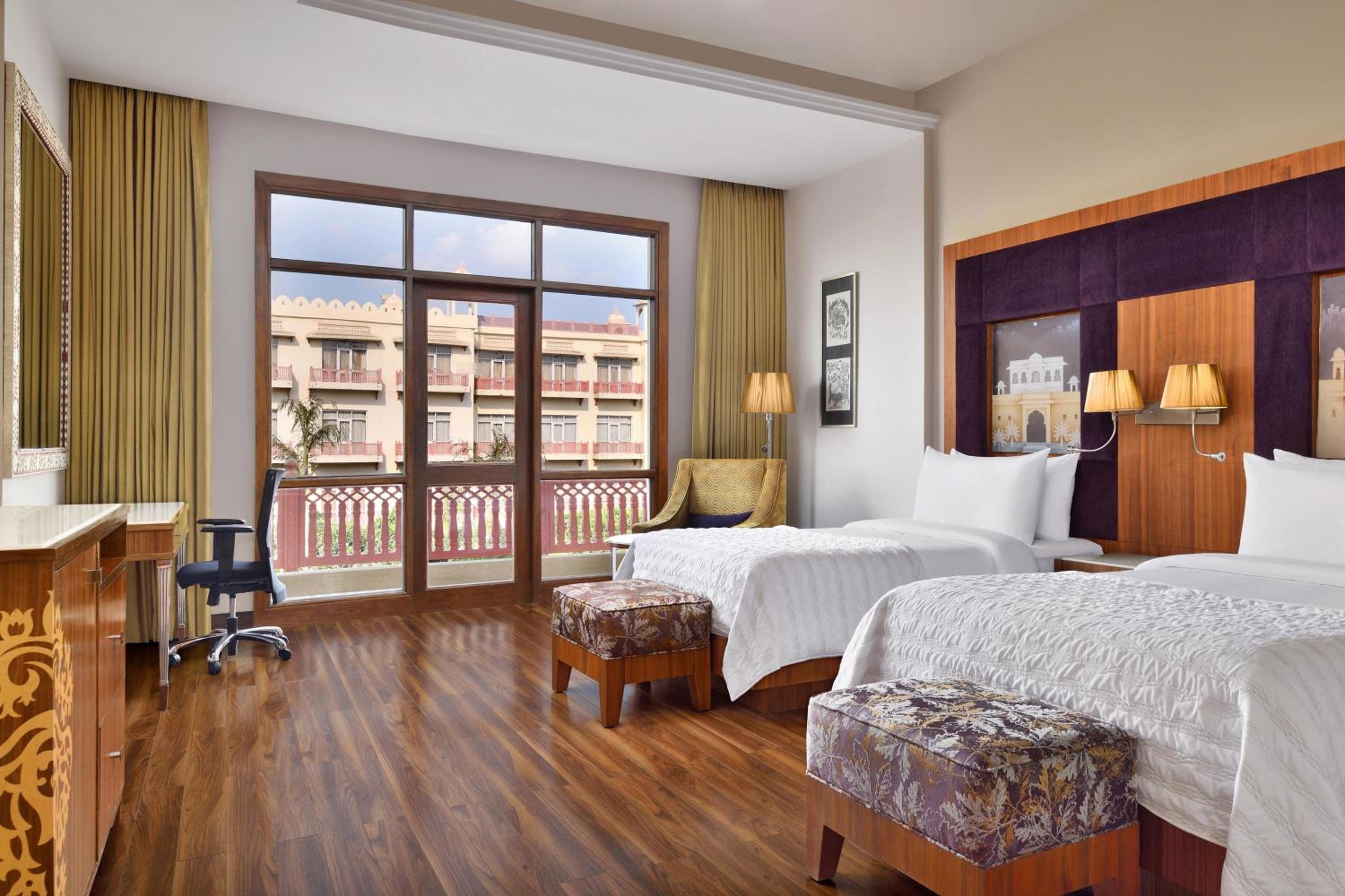 Premium Garden view with Twin Bed(20% discount on food and soft beverages, 20% discount on Spa,Buy 1 get 1 on select brands at Madeira bar between 4 pm - 10 pm)