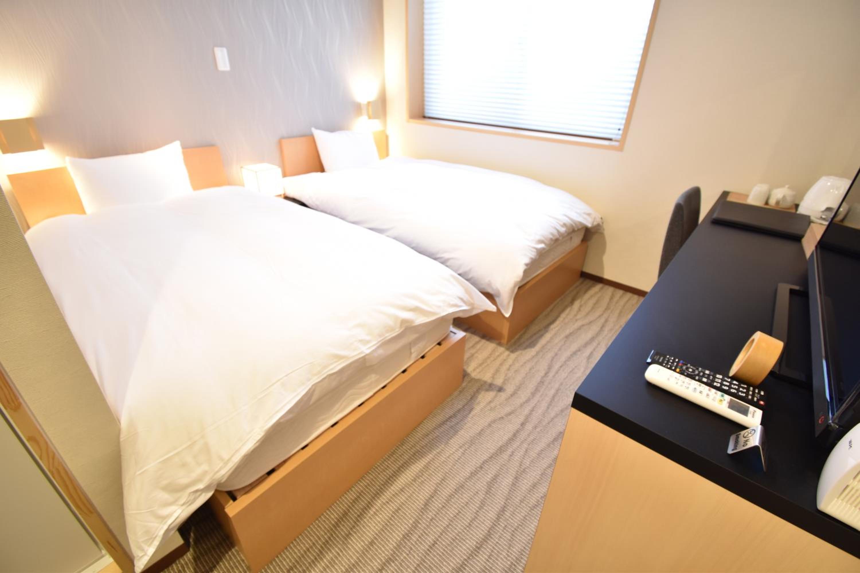 Standard Twin Room - Photo 6