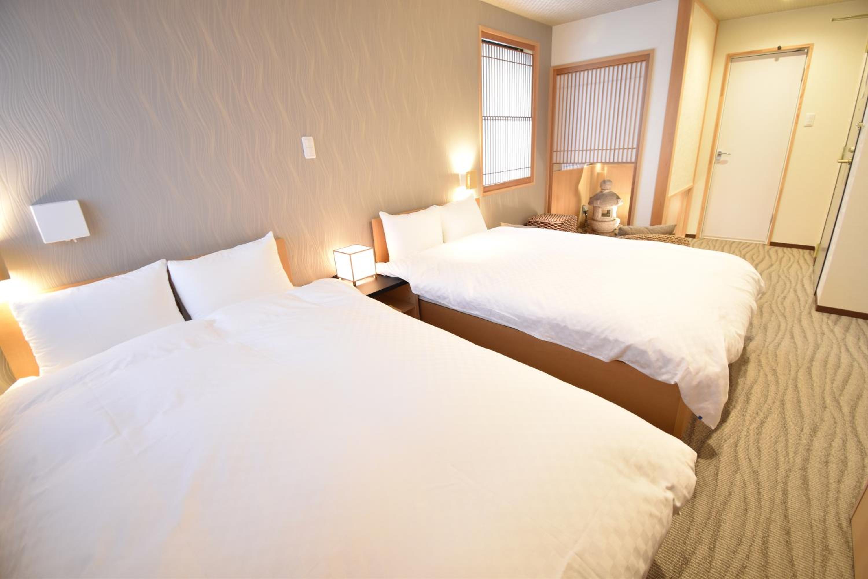 Deluxe Twin Room - Photo 7