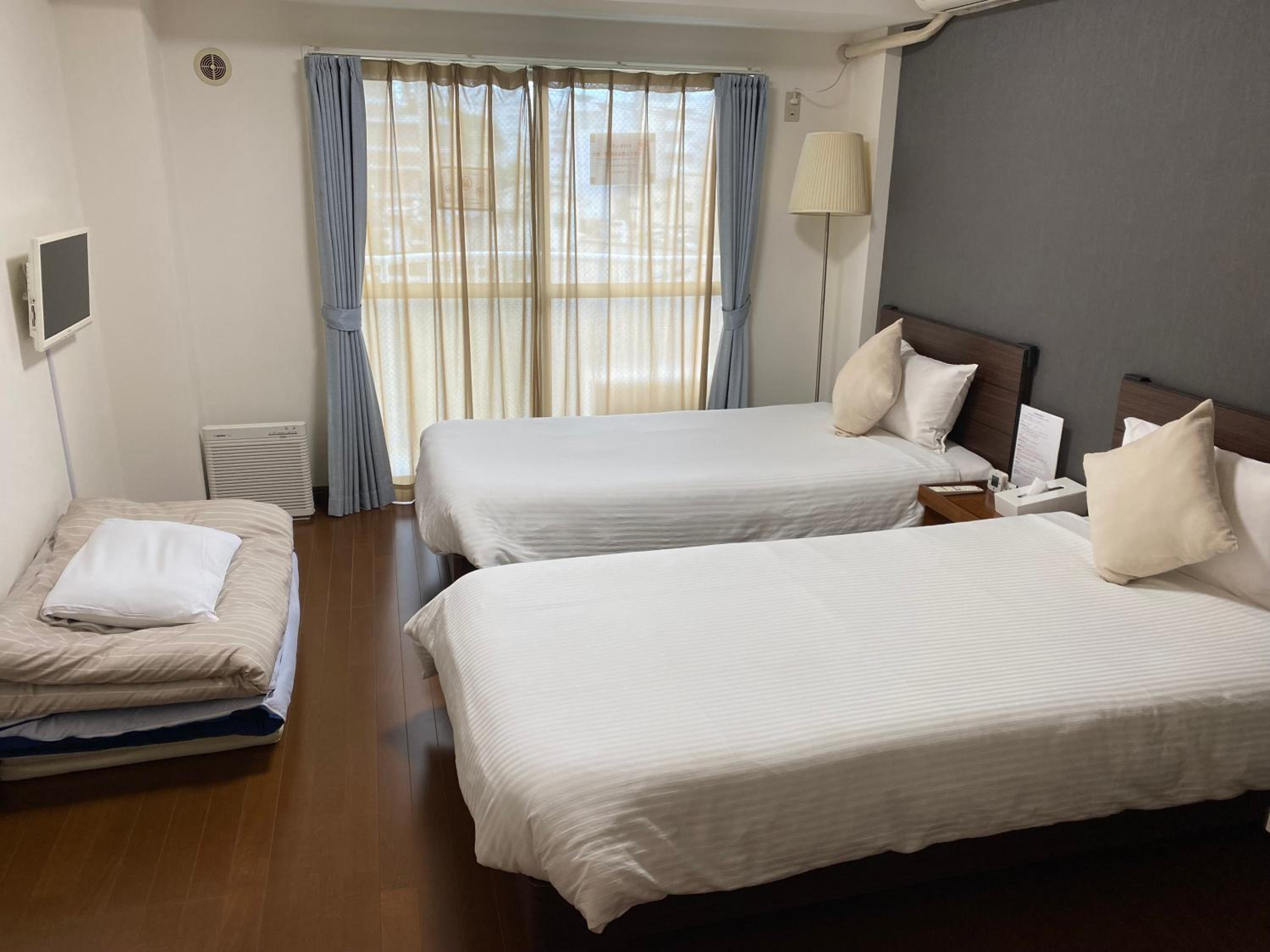 Triple Room - Photo 11