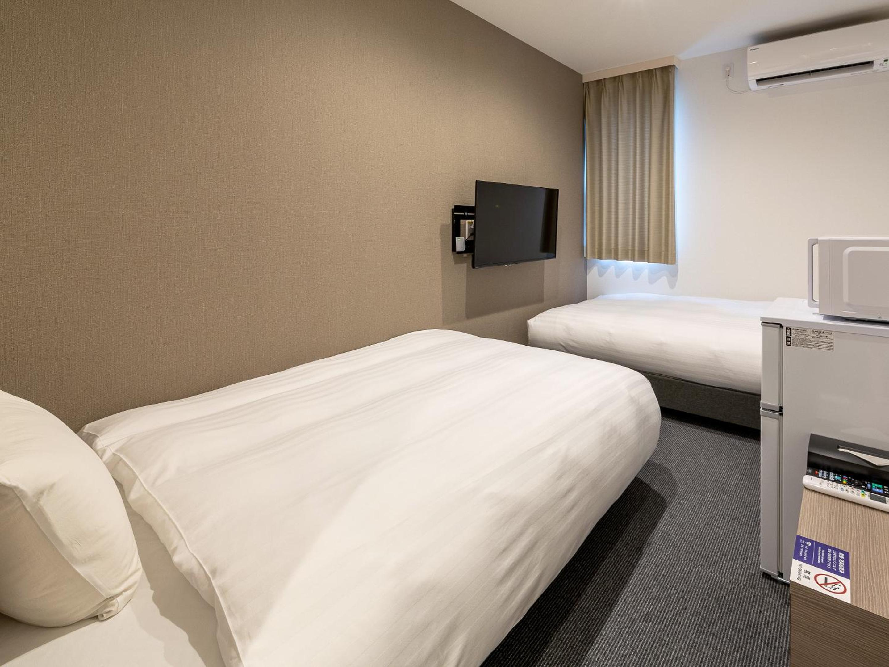 Standard Twin Room - Photo 1