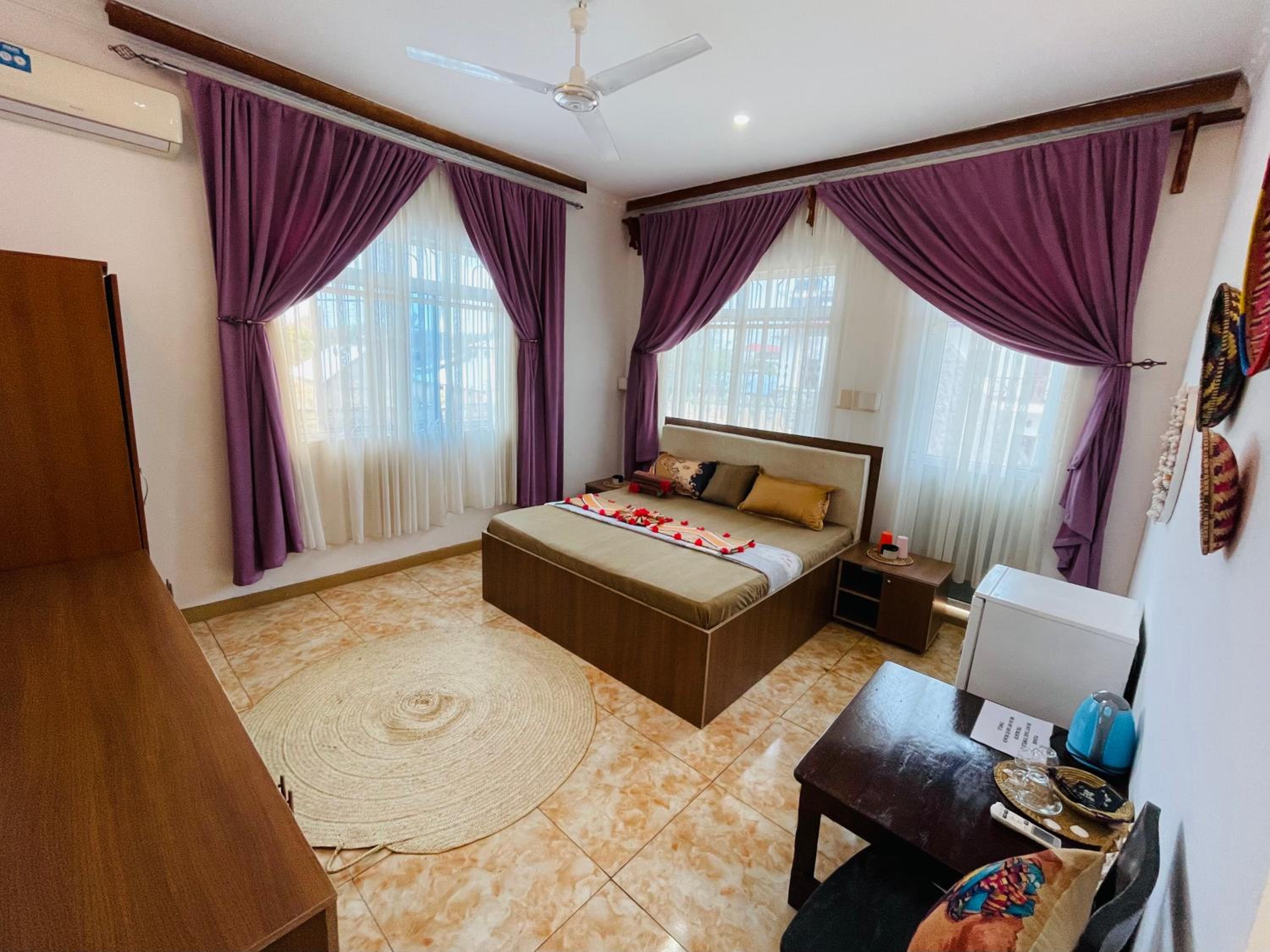 Deluxe Triple Room - Photo 6