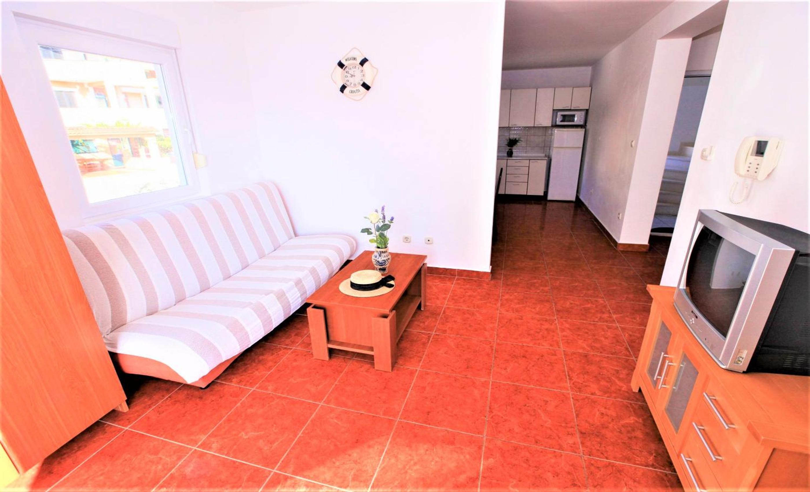 One-Bedroom Apartment with Balcony and Sea View