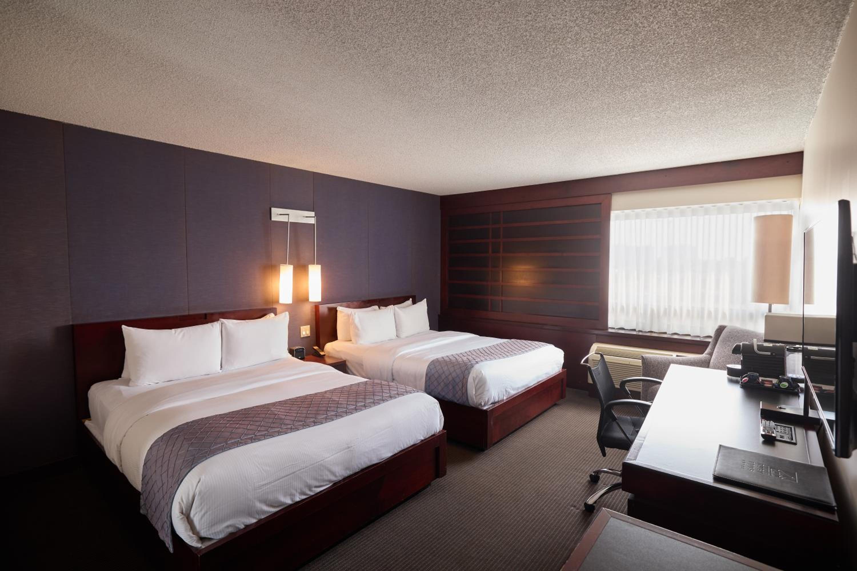 Deluxe Queen Room with Two Queen Beds - Photo 1
