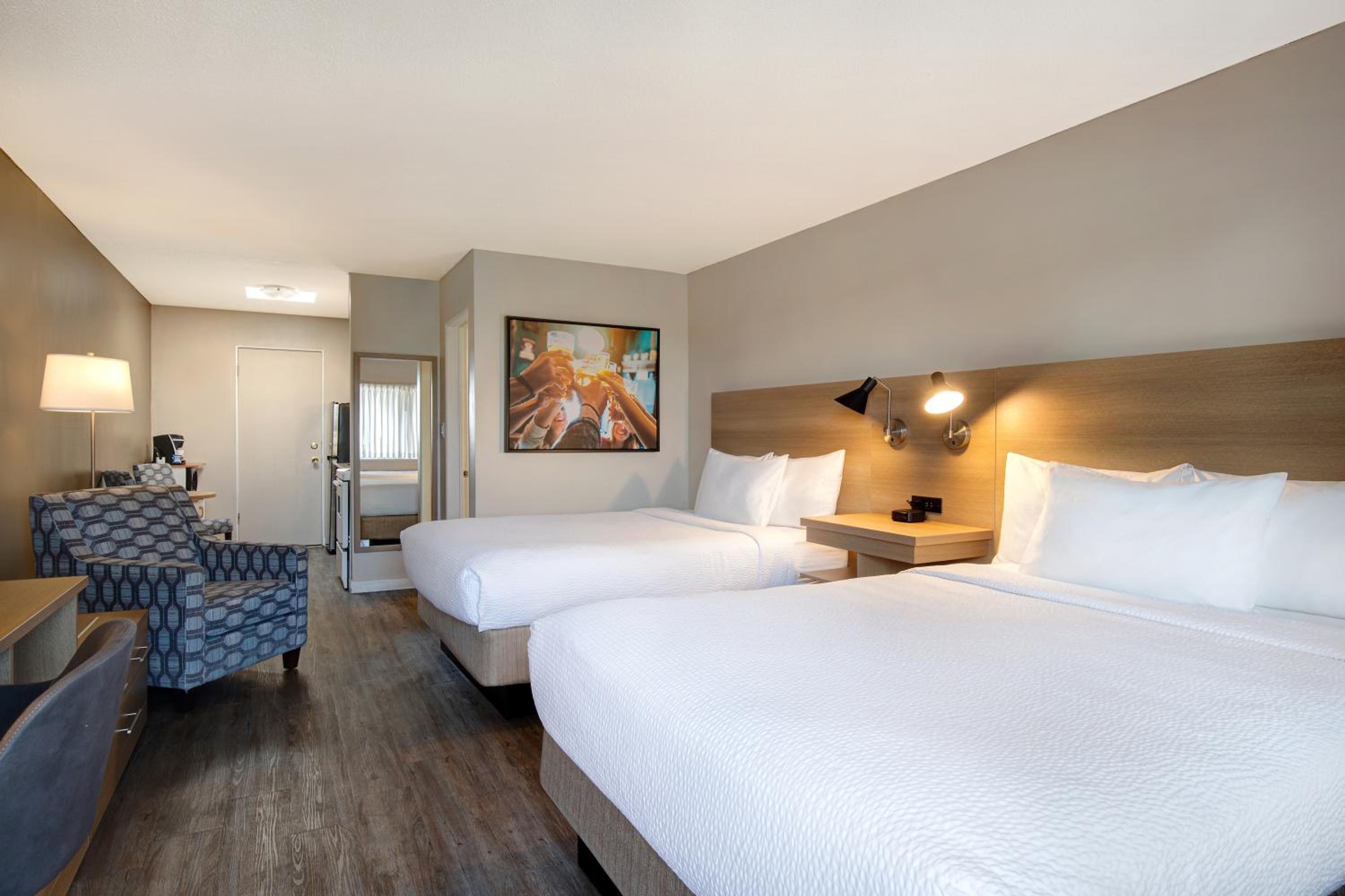 Queen Suite with Two Queen Beds with Limited View- Non-Smoking - Photo 1