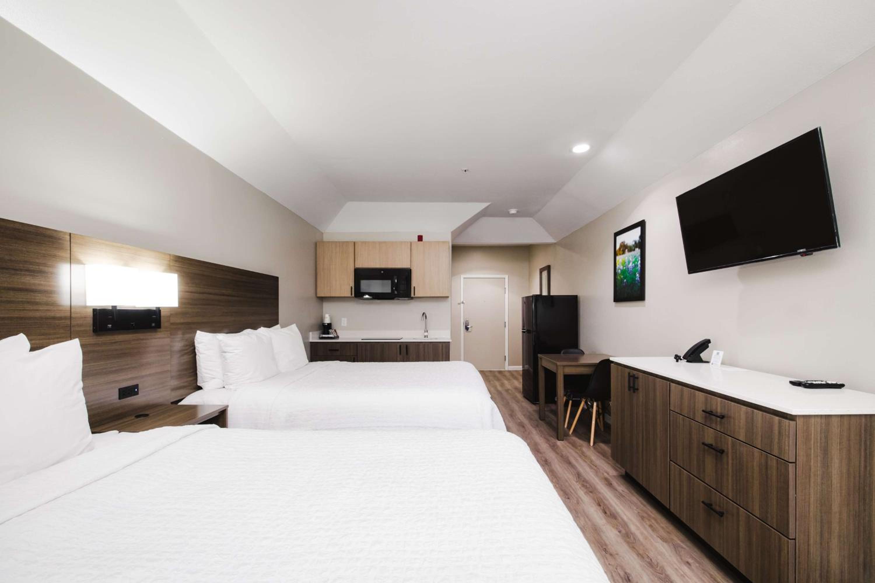 Queen Room with Two Queen Beds with Kitchenette- Non-Smoking - Photo 1