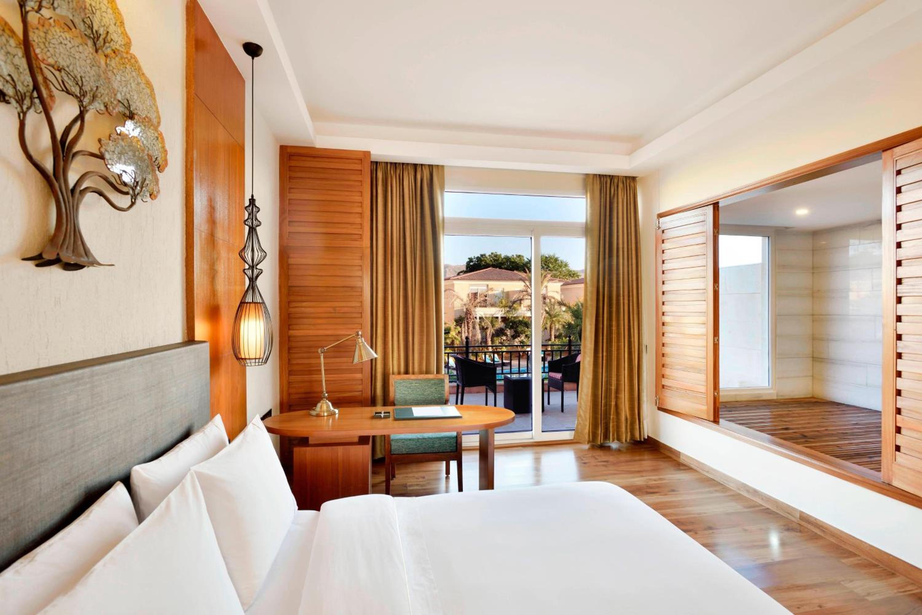 Grand Villa with Balcony and Resort View – Watch 1 Complimentary movie at the in house theater, Early Check-in by 12:00Hrs and Late Check-out by 13:00Hrs (Subject to Availability) photo