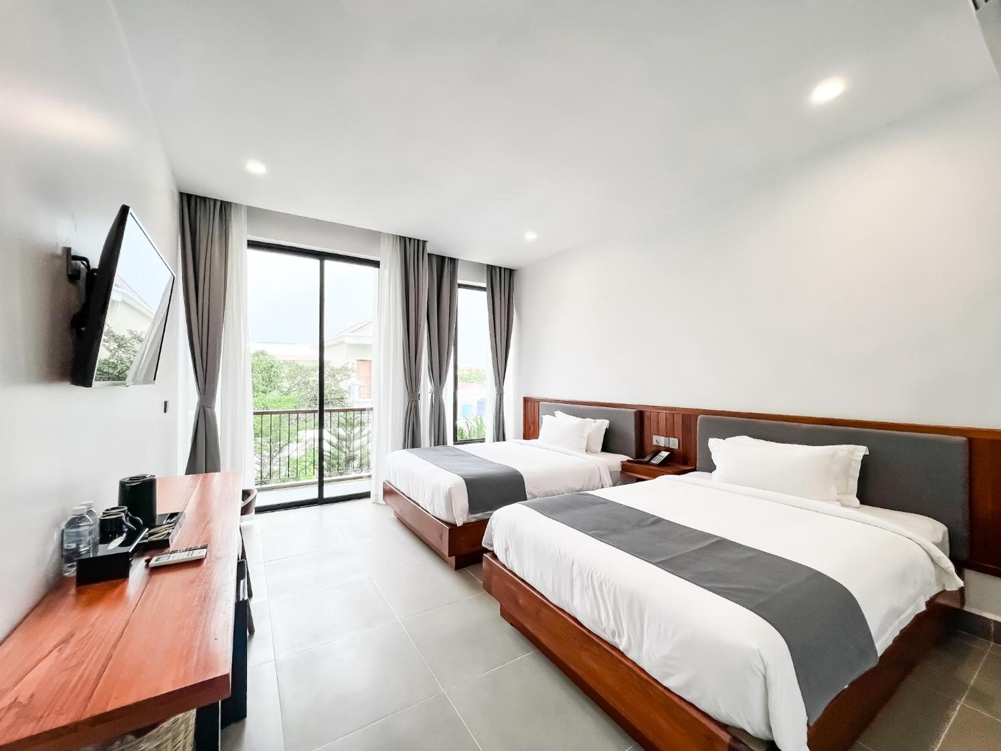 Standard Twin Room - Photo 1