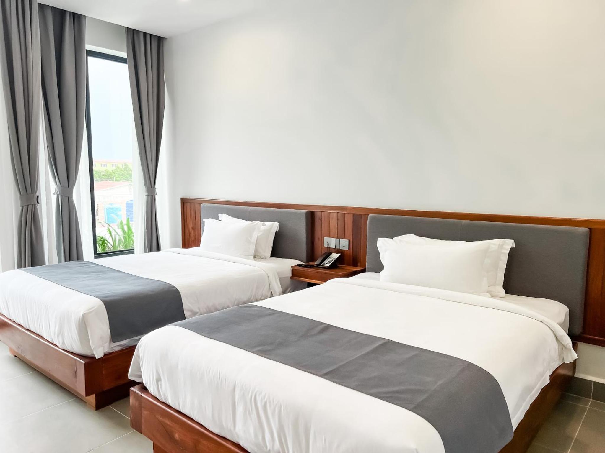 Standard Twin Room - Photo 3