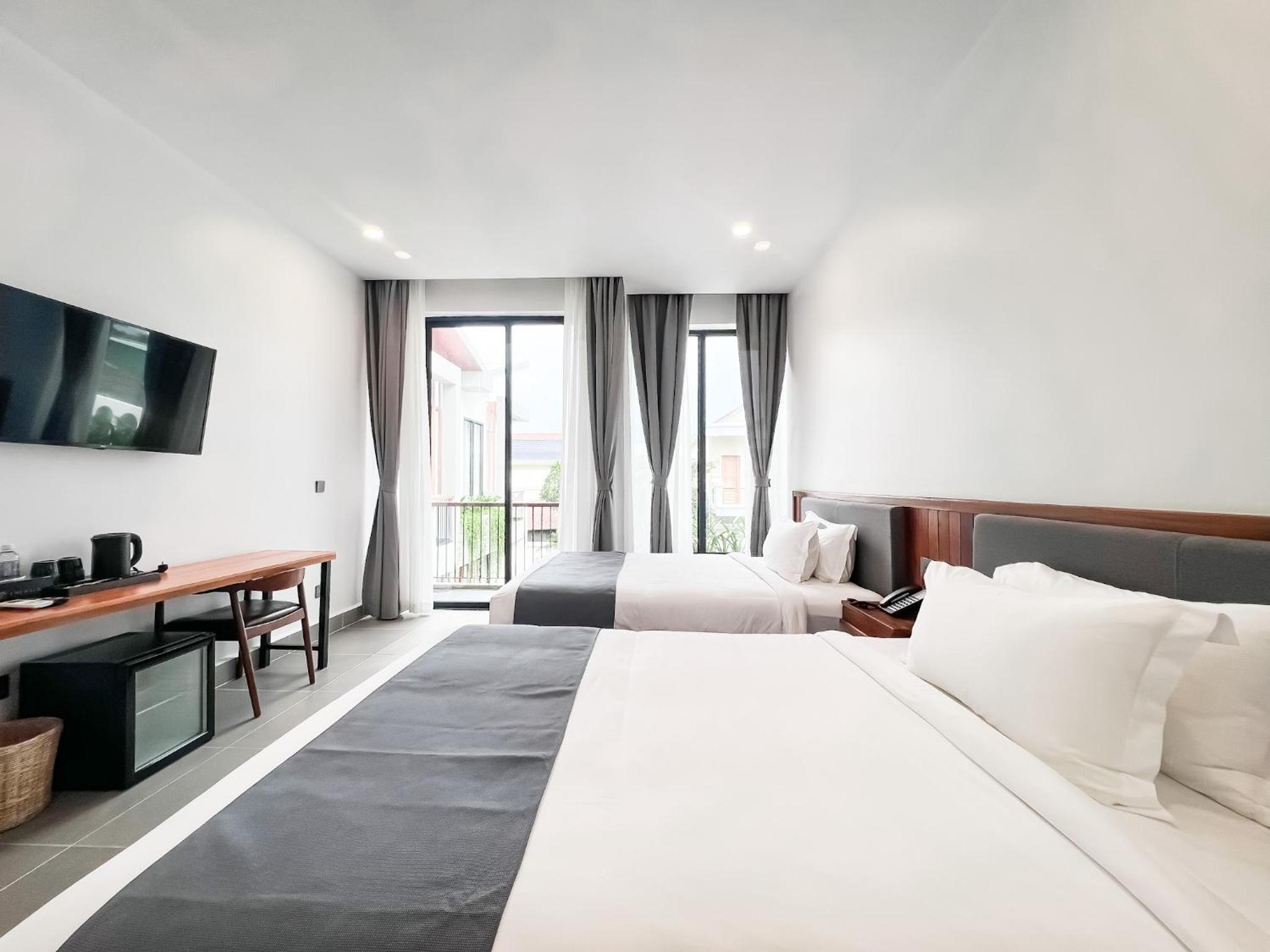 Standard Twin Room - Photo 4