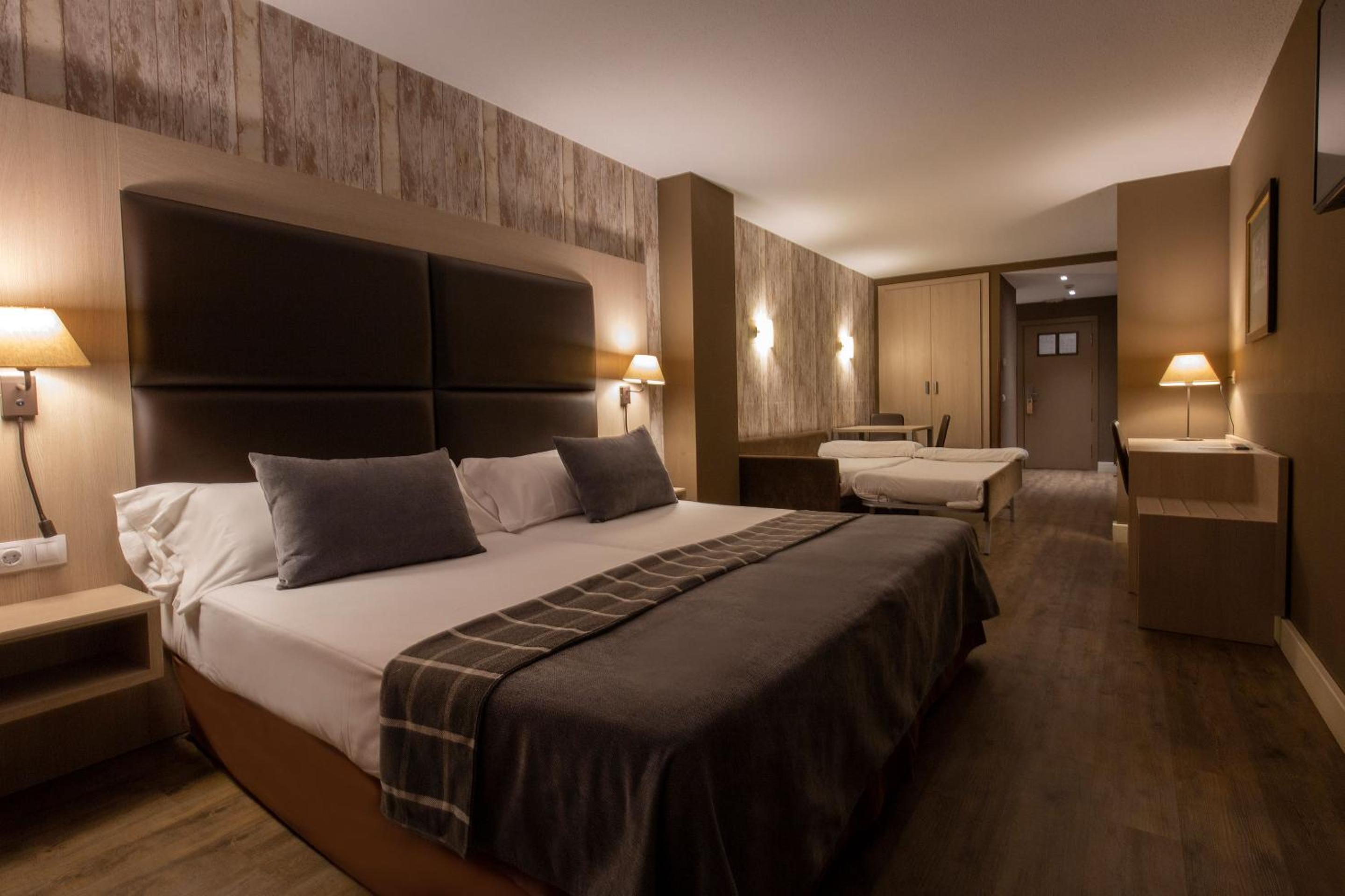 Quadruple Room (2 Adults + 2 Children)