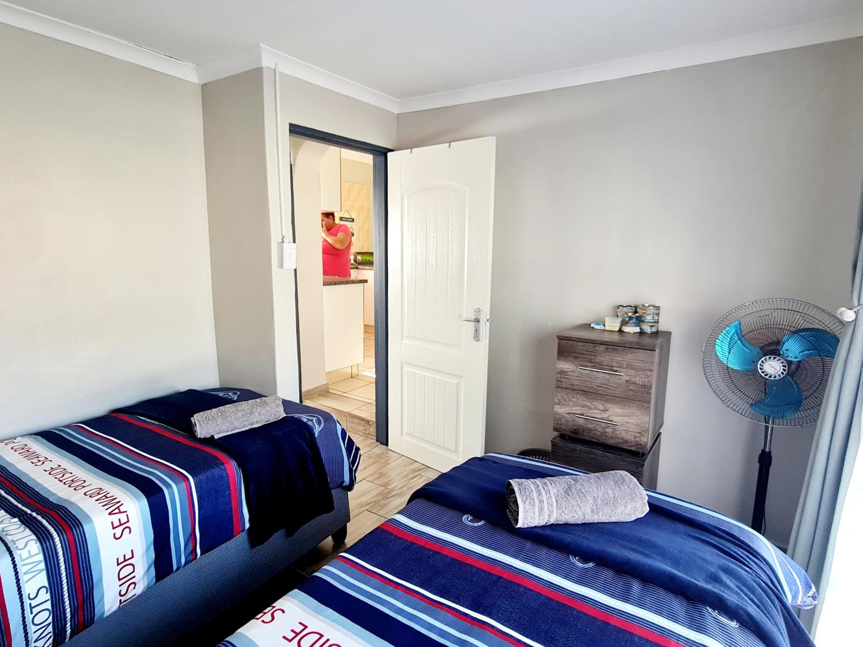 Three-Bedroom Apartment - Photo 25