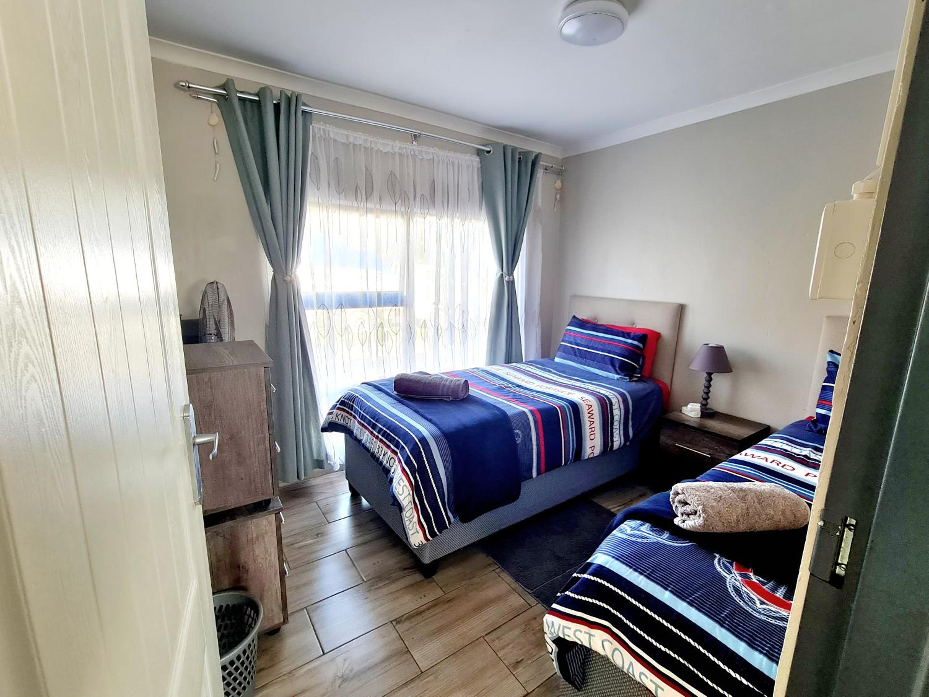 Three-Bedroom Apartment - Photo 24