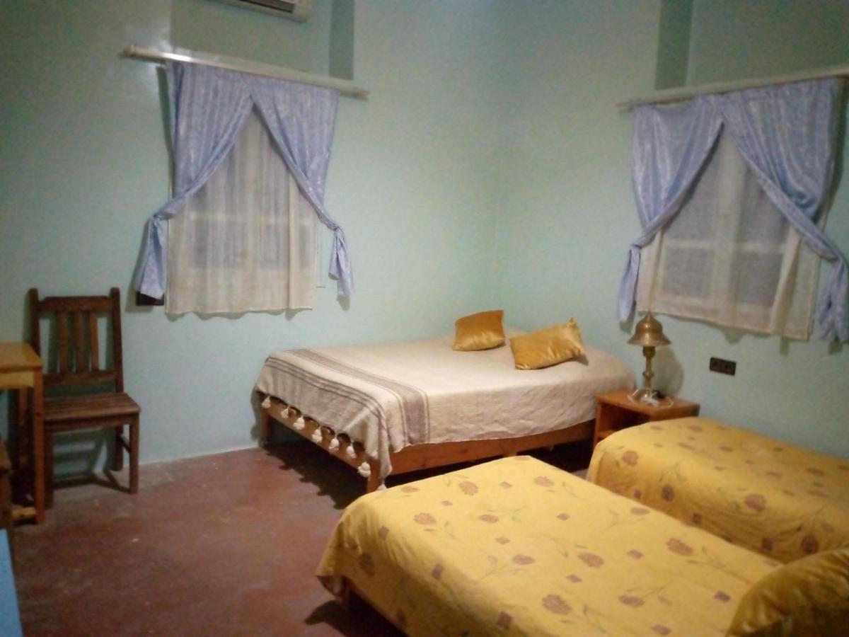 Basic Triple Room with Shared Bathroom photo 1
