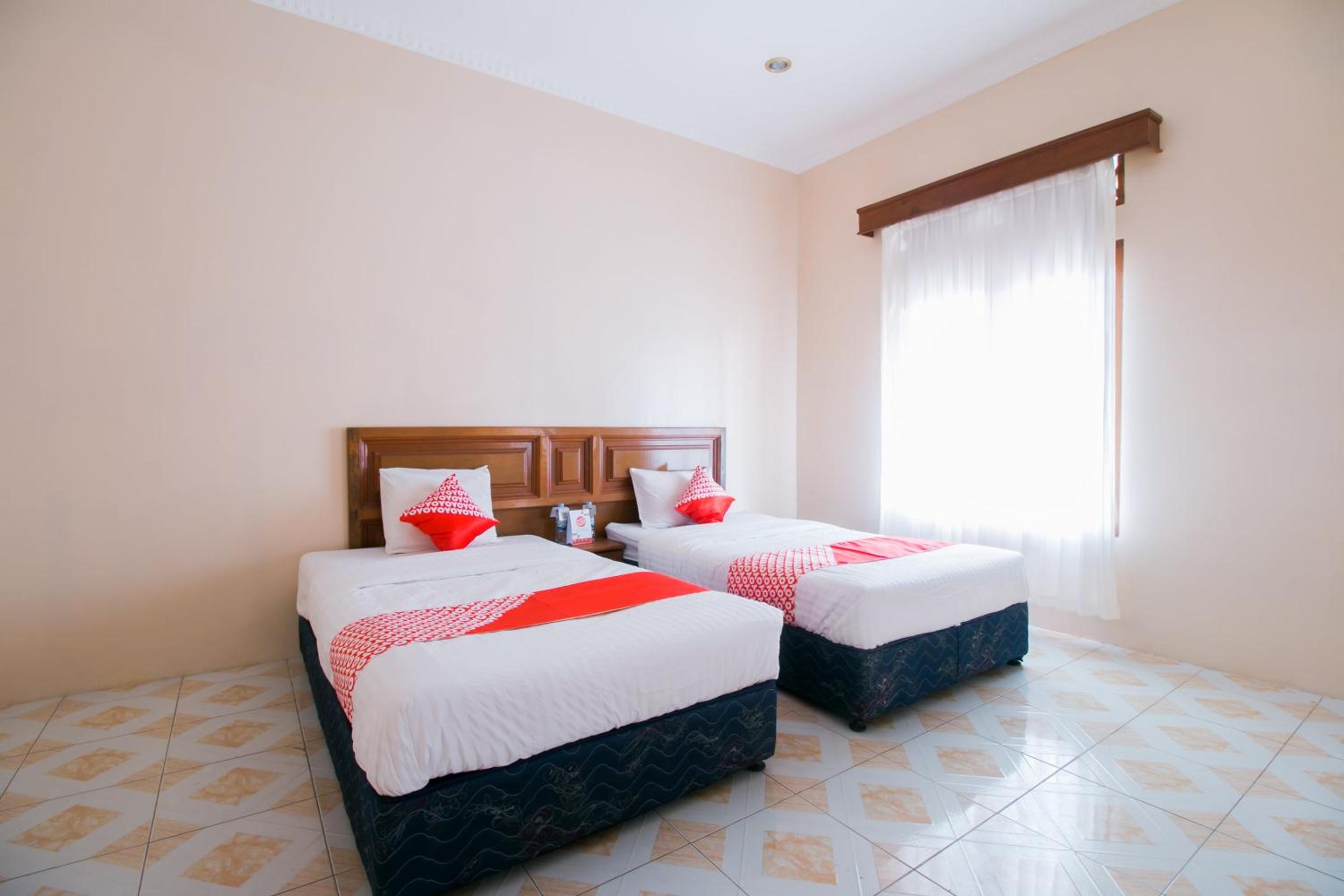Delxue Twin Room - Photo 1