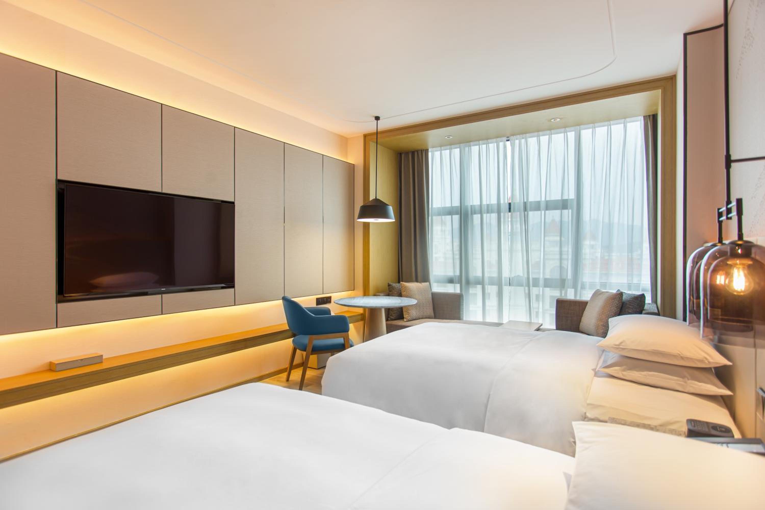 Deluxe Double Room with Two Double Beds and City View - Photo 1