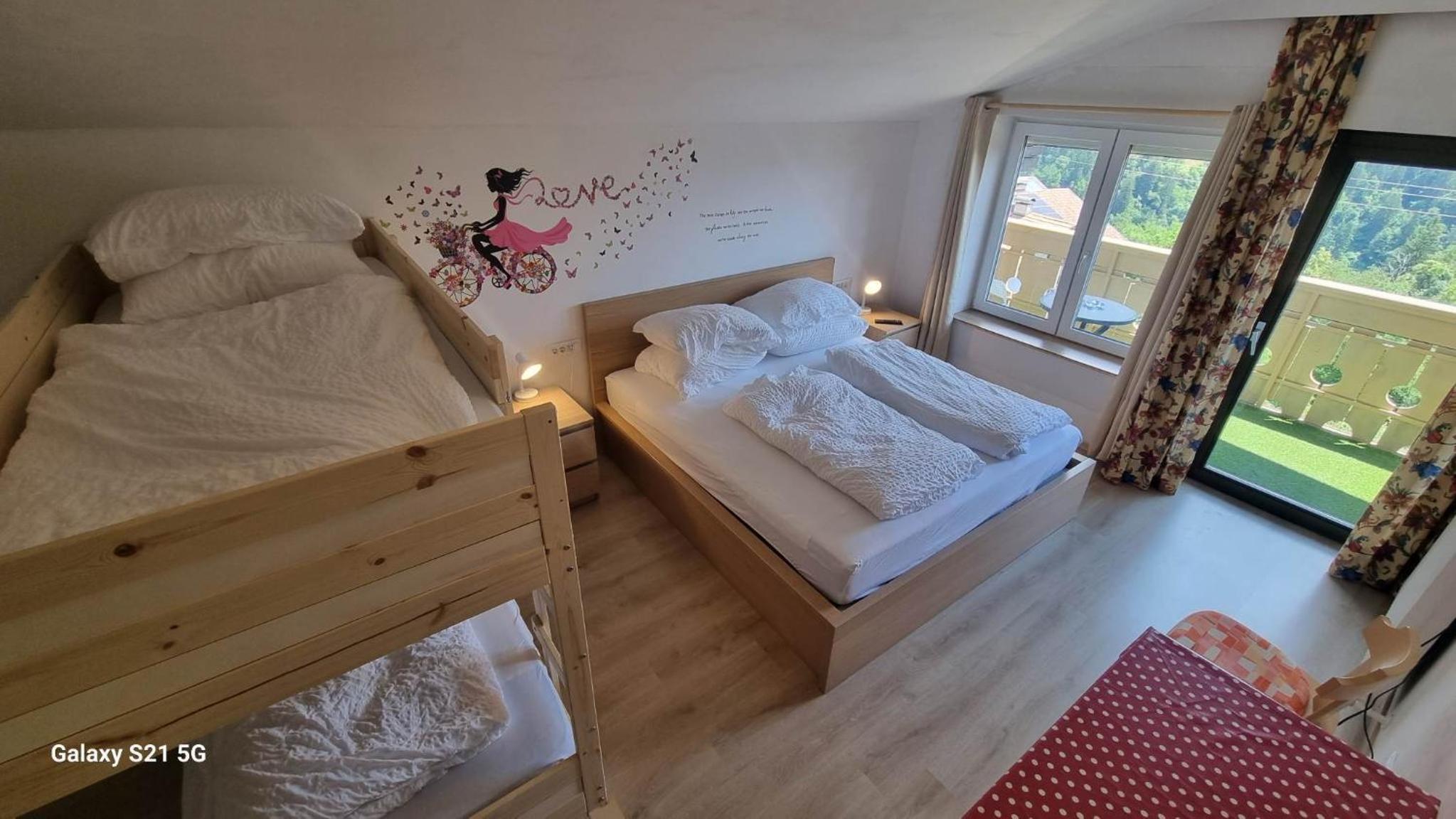 Quadruple Room with Balcony - Photo 1