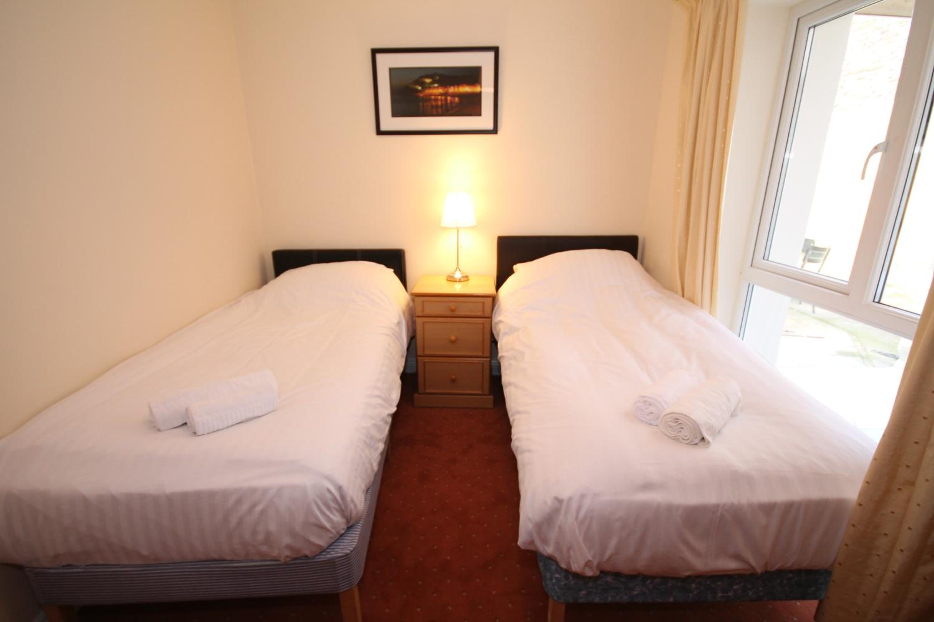 Three-Bedroom Apartment - Photo 27