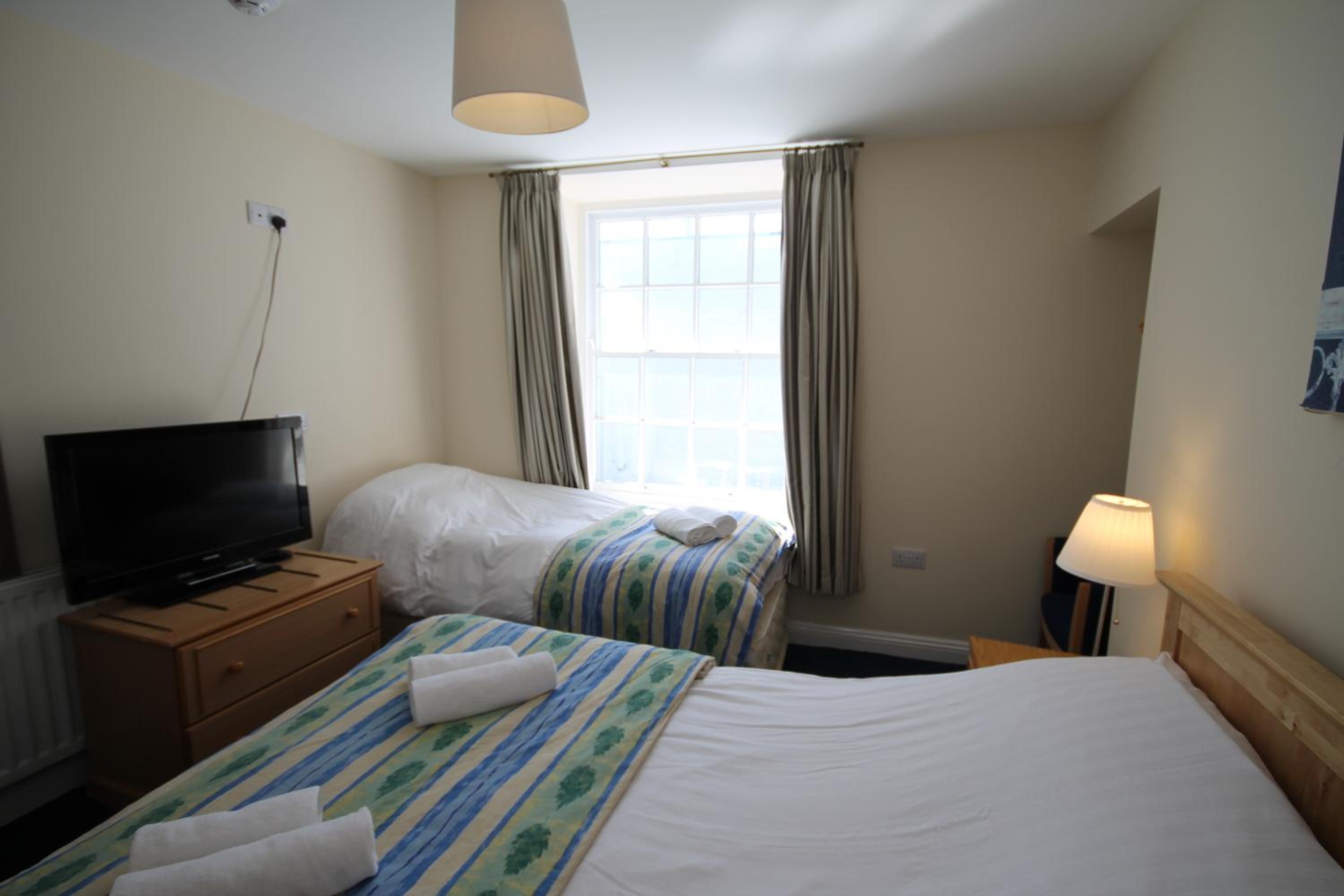 Three-Bedroom Apartment - Photo 5