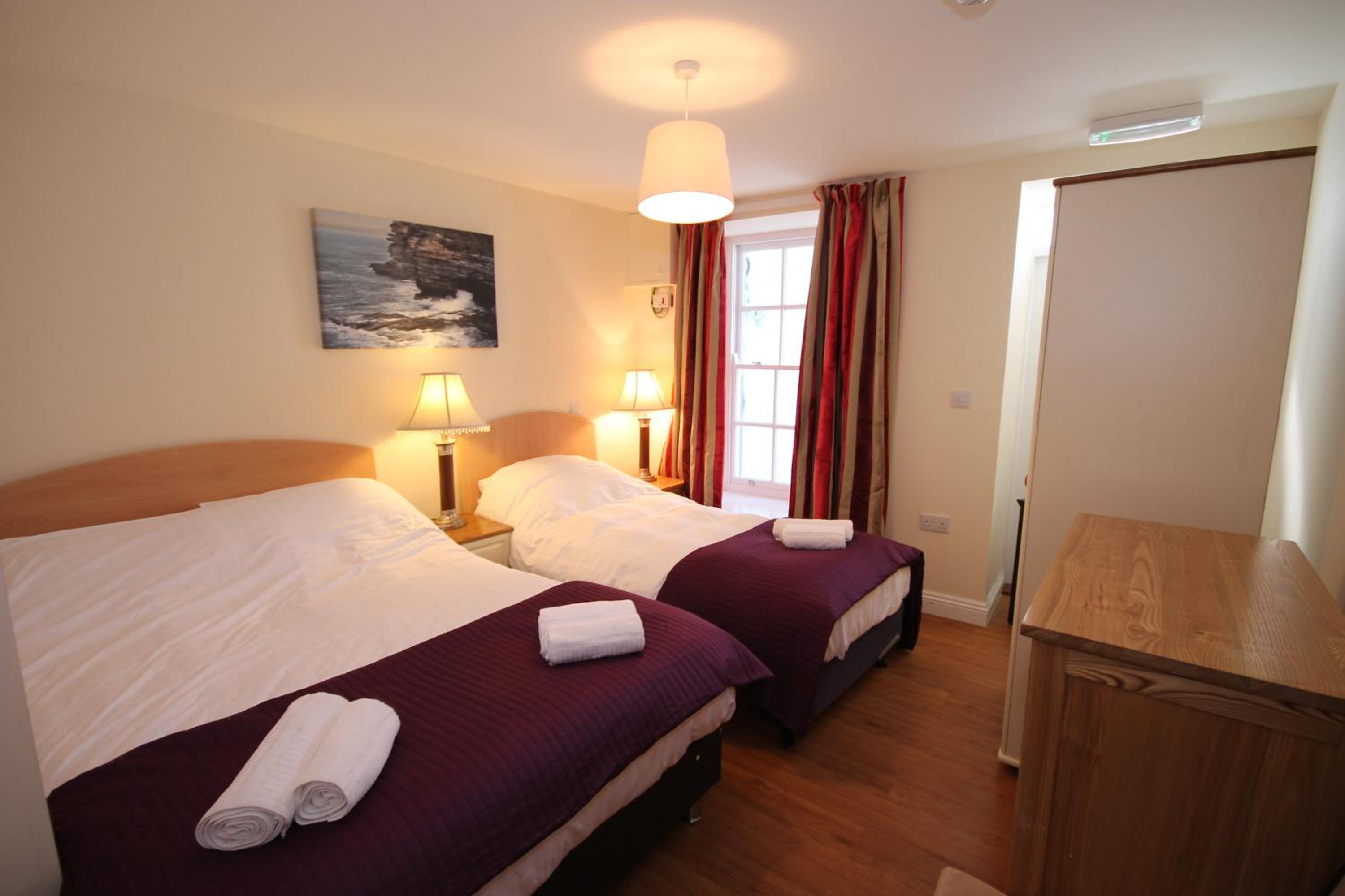 Three-Bedroom Apartment - Photo 7