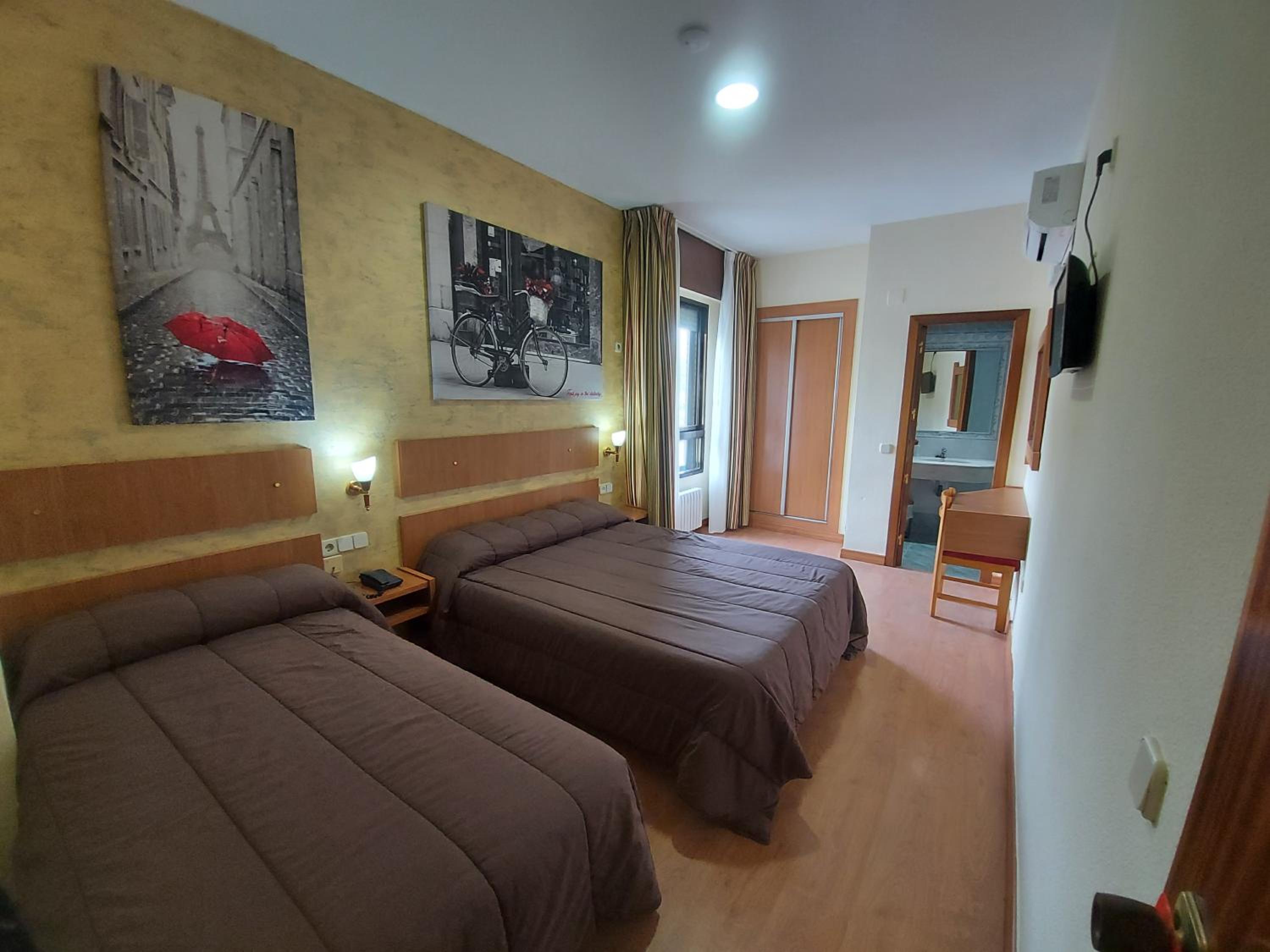 Habitación familiar (2 adultos + 1 niño)