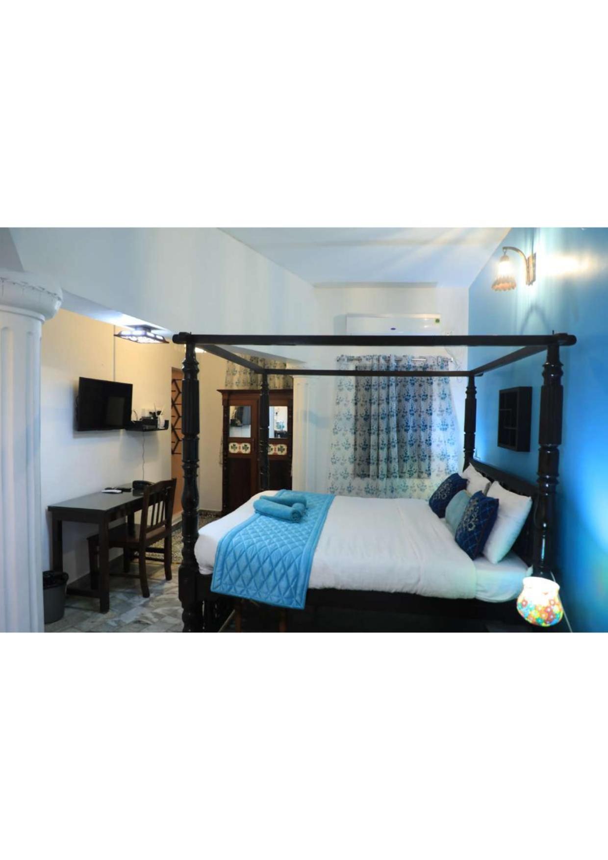 Deluxe Room - Photo 4