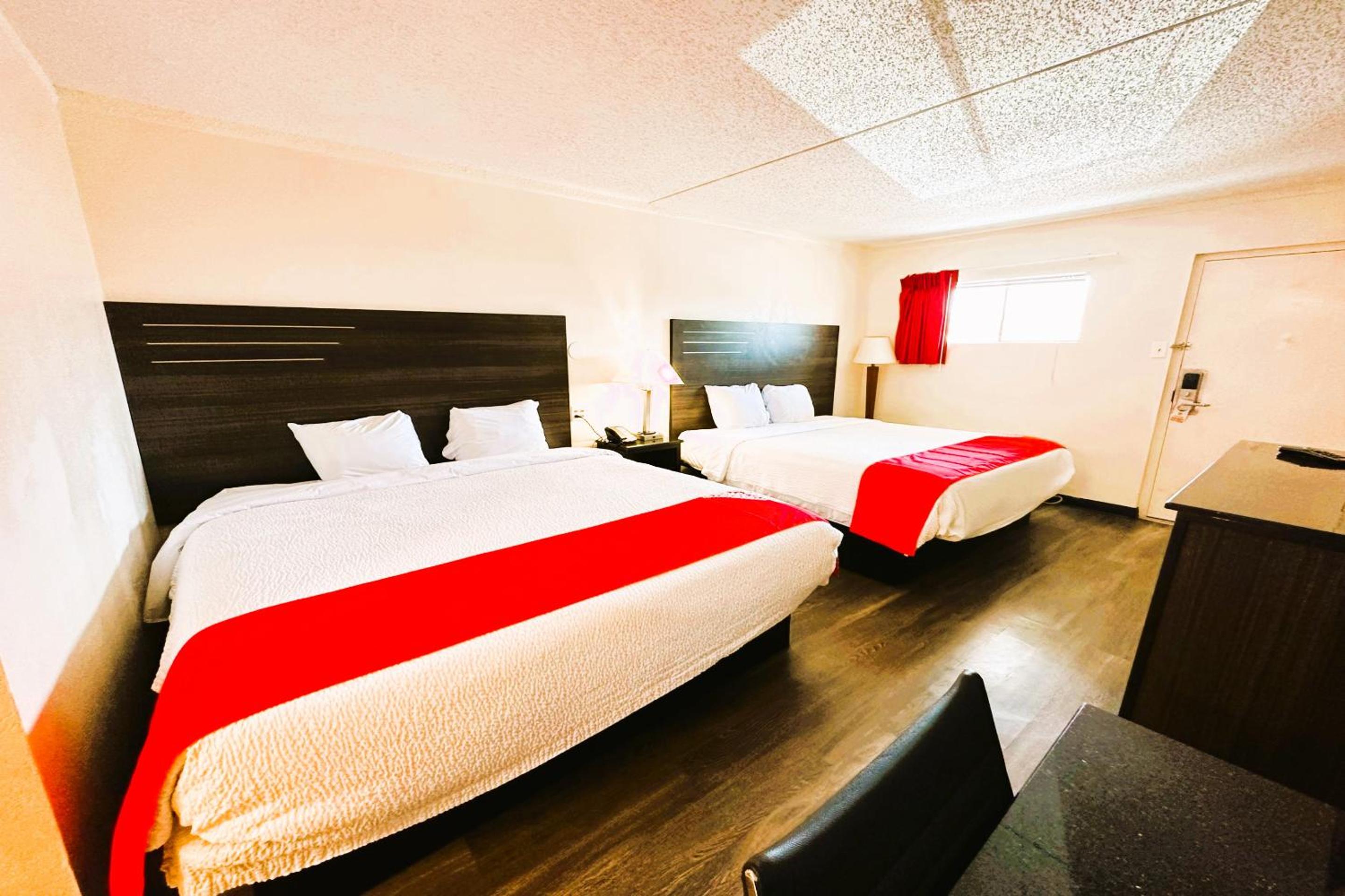 Queen Room with Two Queen Beds - Photo 1