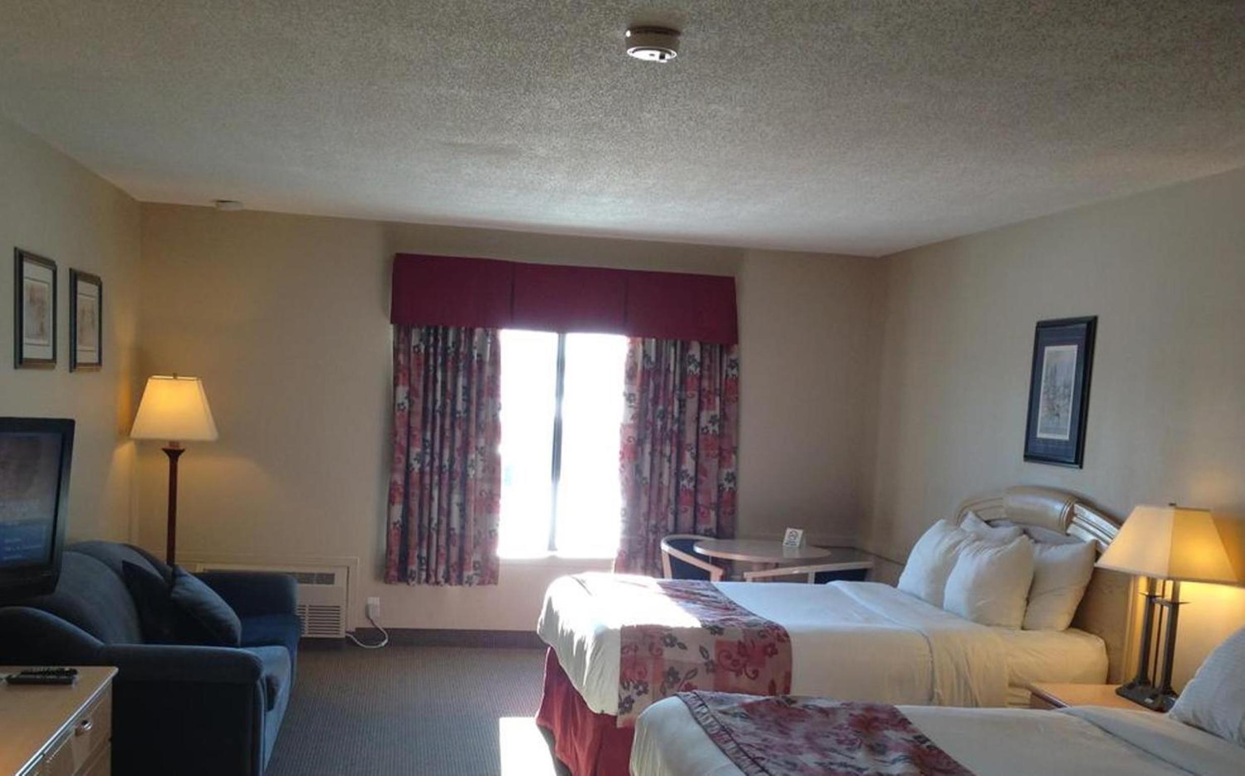 Queen Room with Two Queen Beds - Photo 1