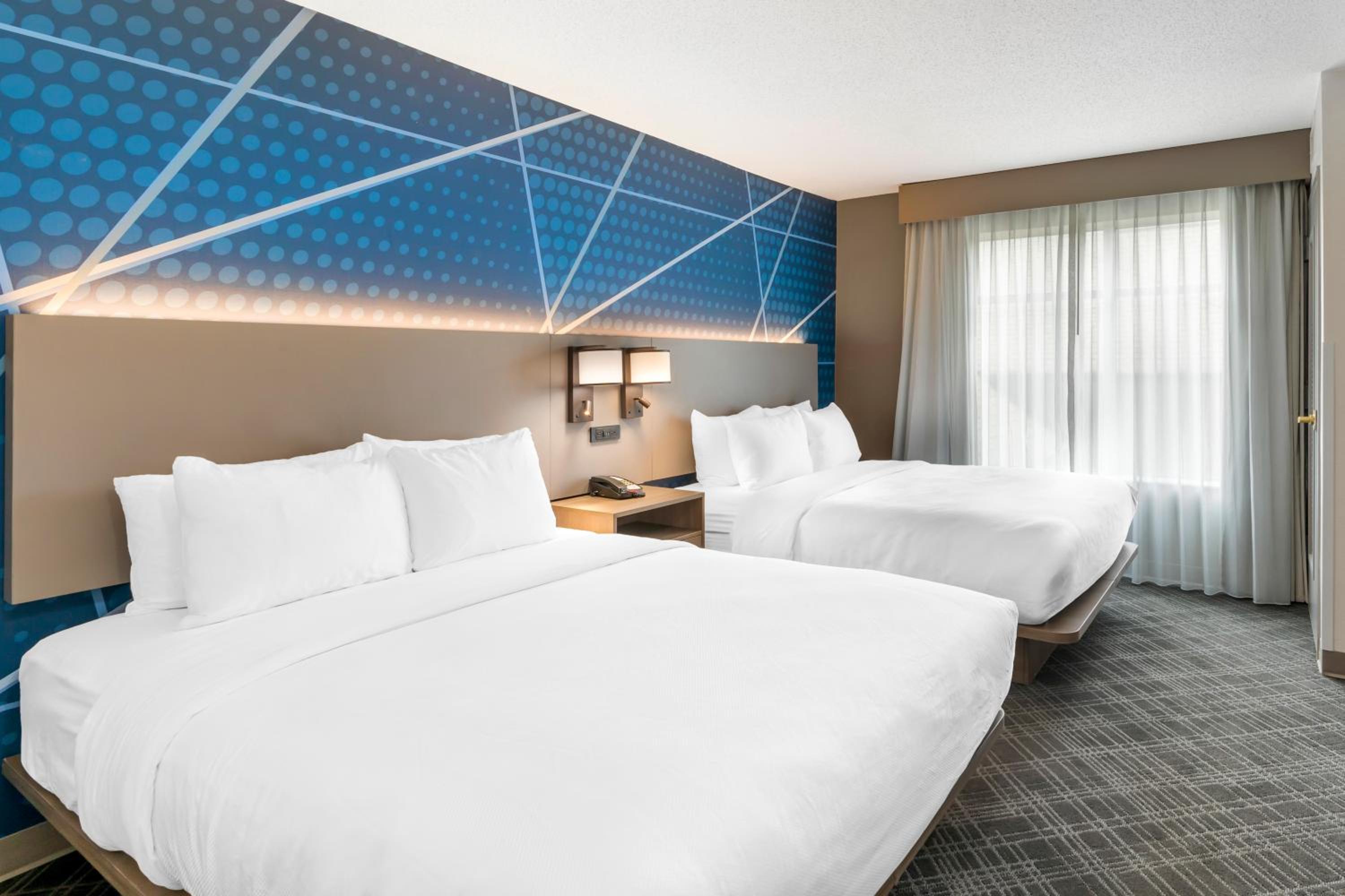 One-Bedroom Suite with Two Queen Beds and Sofa Bed - Non-Smoking - Photo 1