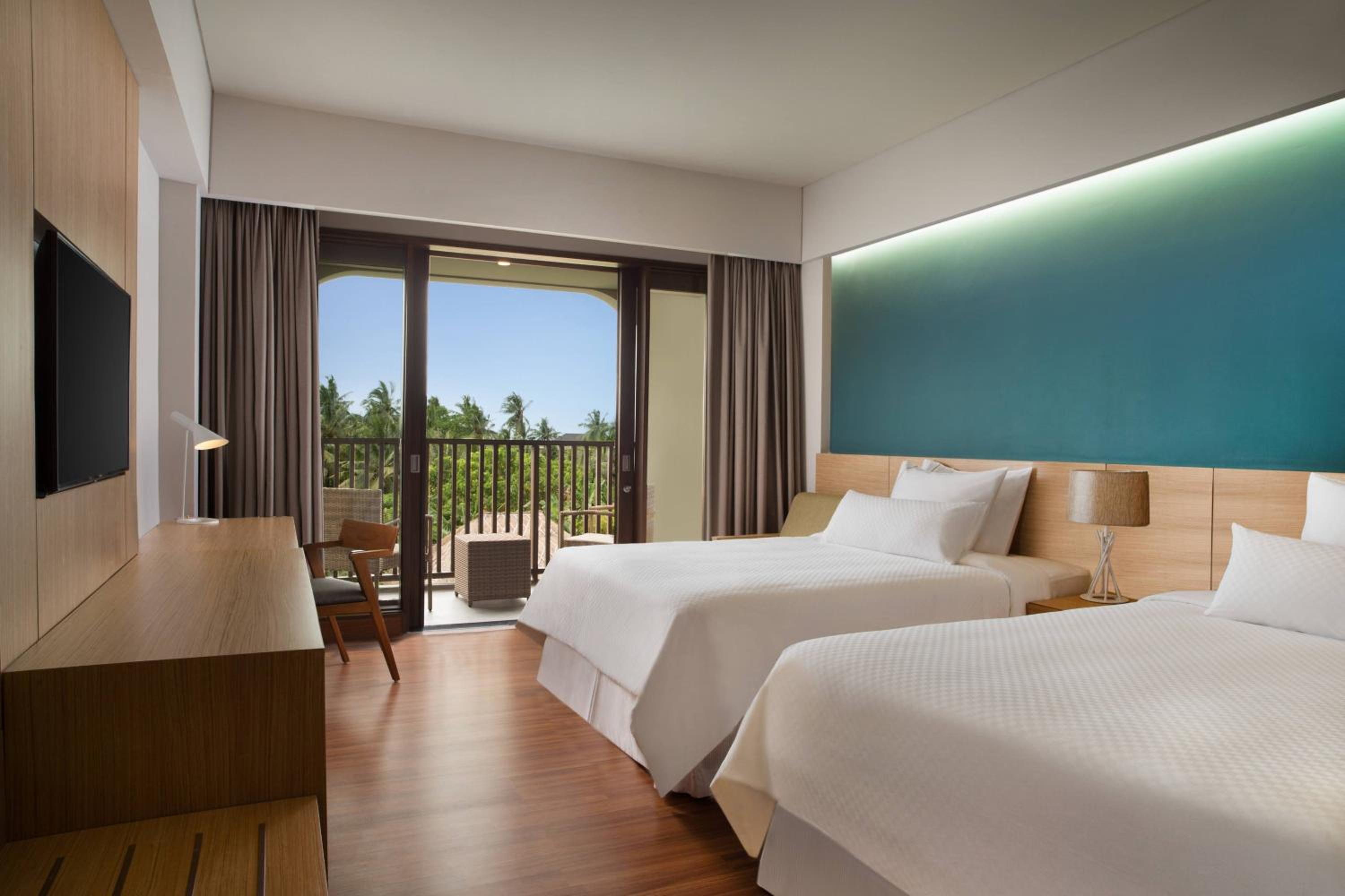 Deluxe Room, Guest room, 2 Twin/Single Bed(s), Garden view, Balcony with Daily Shuttle to Monkey Forest, Daily Yoga, Free Bike to borrow,  Free Family Activity and 24 Hour access to Motion Fitness Center photo 1