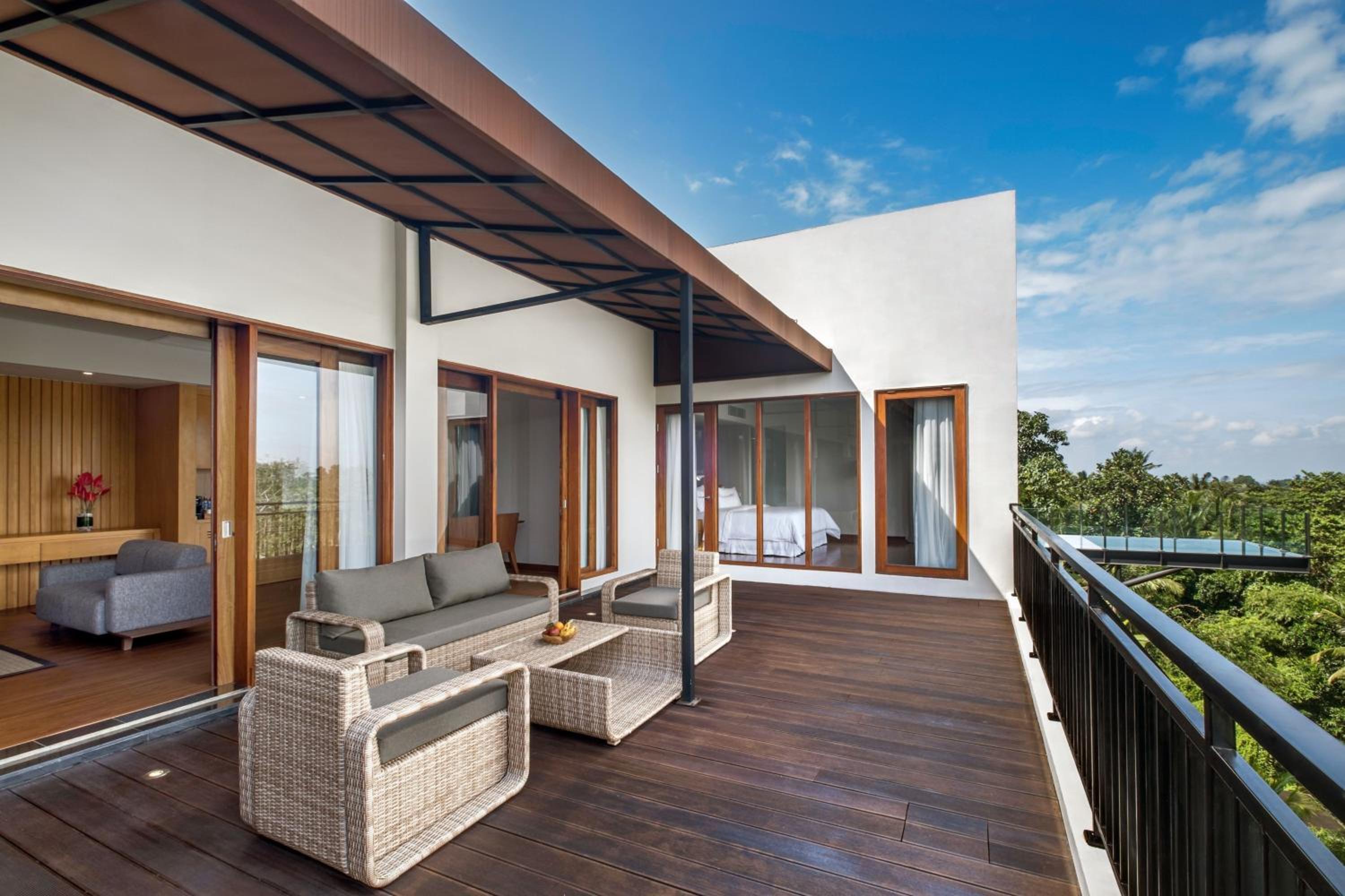 Puri Penthouse, Penthouse, 1 King, Garden view, Balcony with  Free Mini Bar, Daily Shuttle to Monkey Forest, Daily Yoga, Free Bike to borrow,  Free Family Activity and 24 Hour access to Motion Fitness Center photo 2