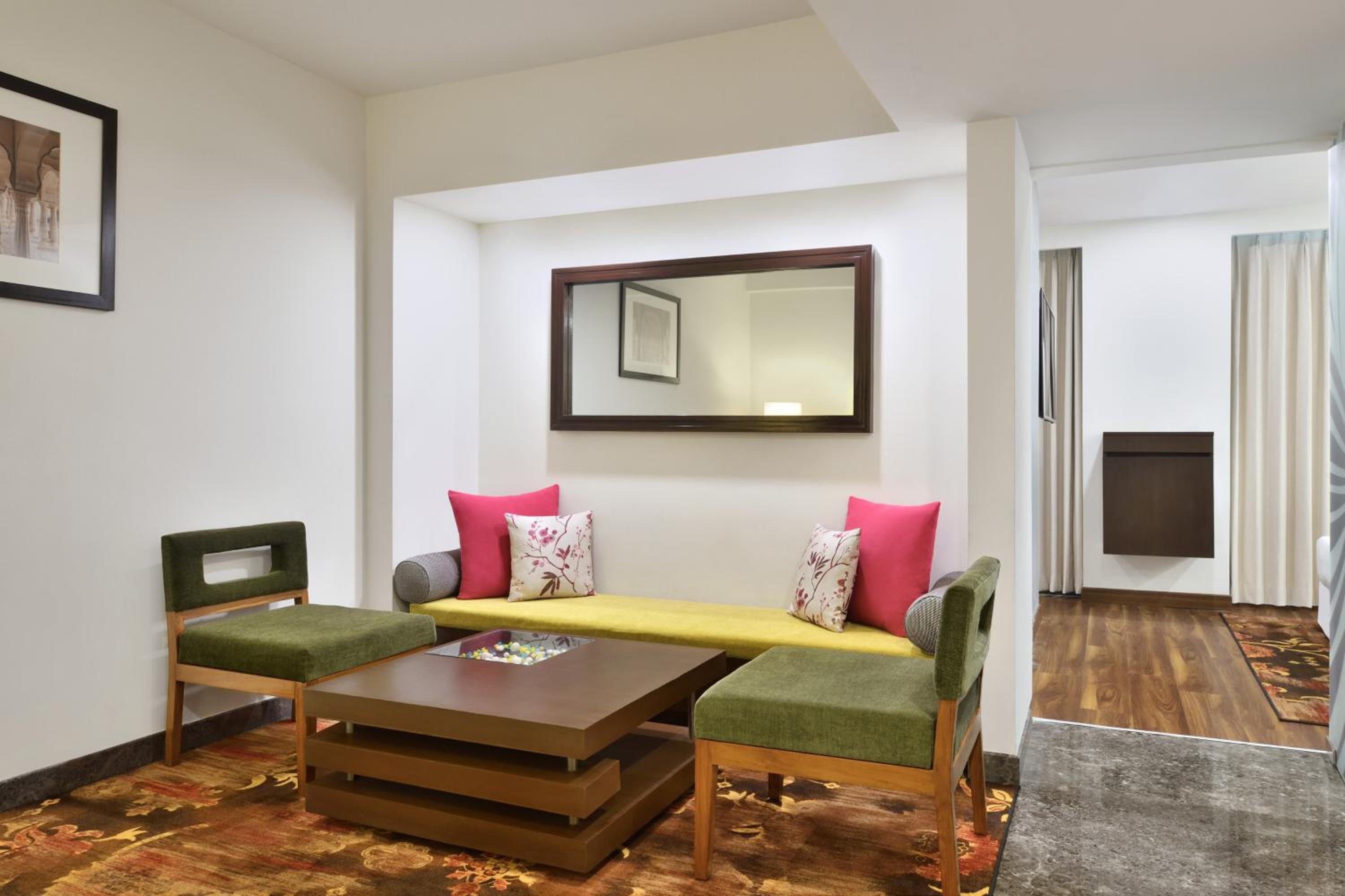 Deluxe Suite(15 Mins comp Head Massage, High Tea, (4-5PM), 20% off on SPA, Laundry and Food & Soft Beverages only at The Eatery, One way Airport/Railway Transfer complimentary, Credit Meal of INR 1000/- in a the stay on Minimum bill amount of INR 2500/-)