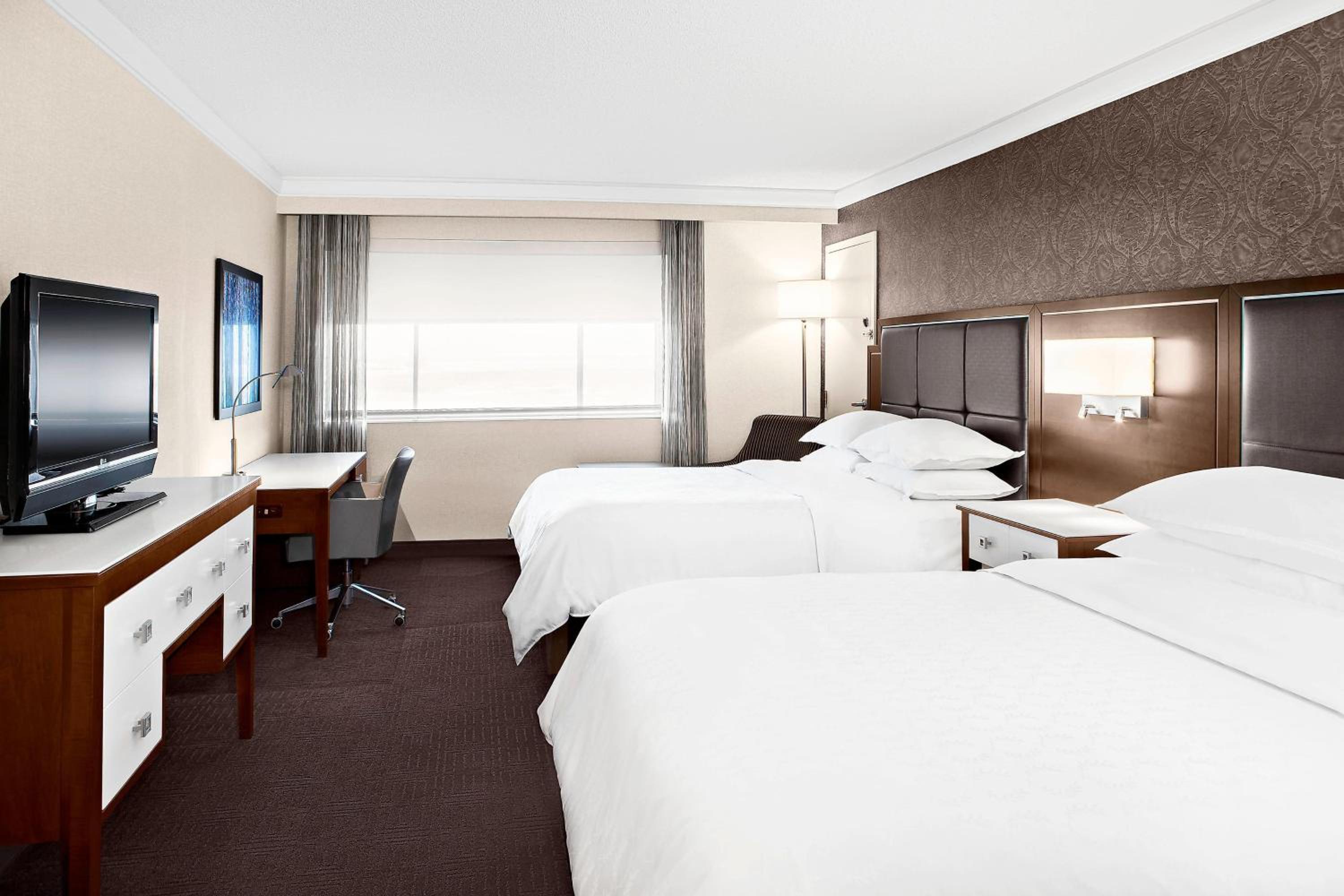 Queen Room with Two Queen Beds - Photo 1