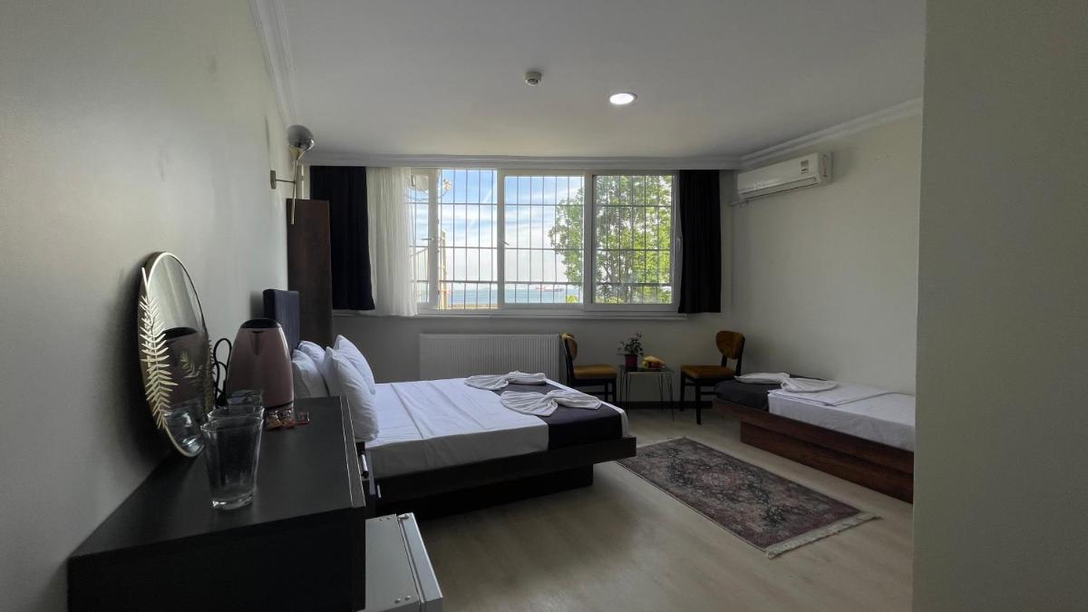 Superior Triple Room with Sea View photo 2
