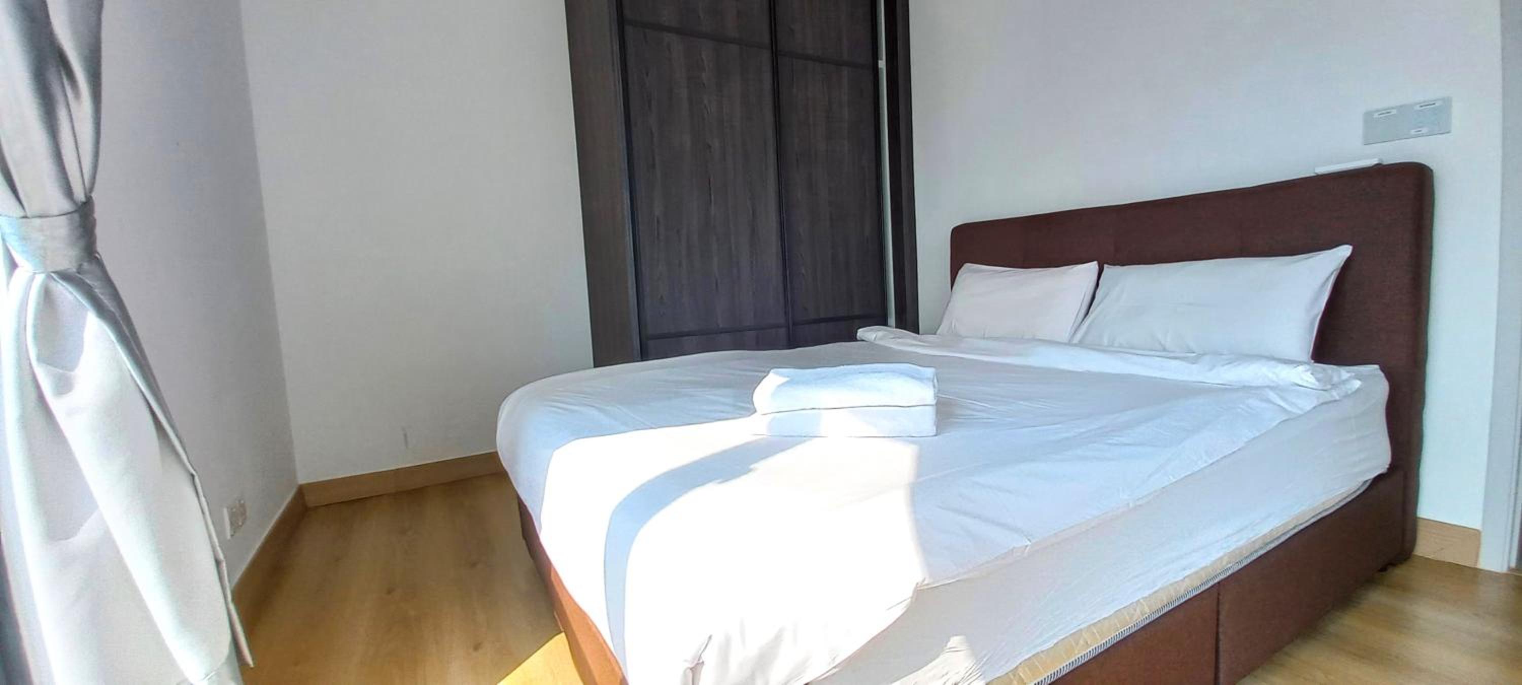 Three-Bedroom Apartment - Photo 2