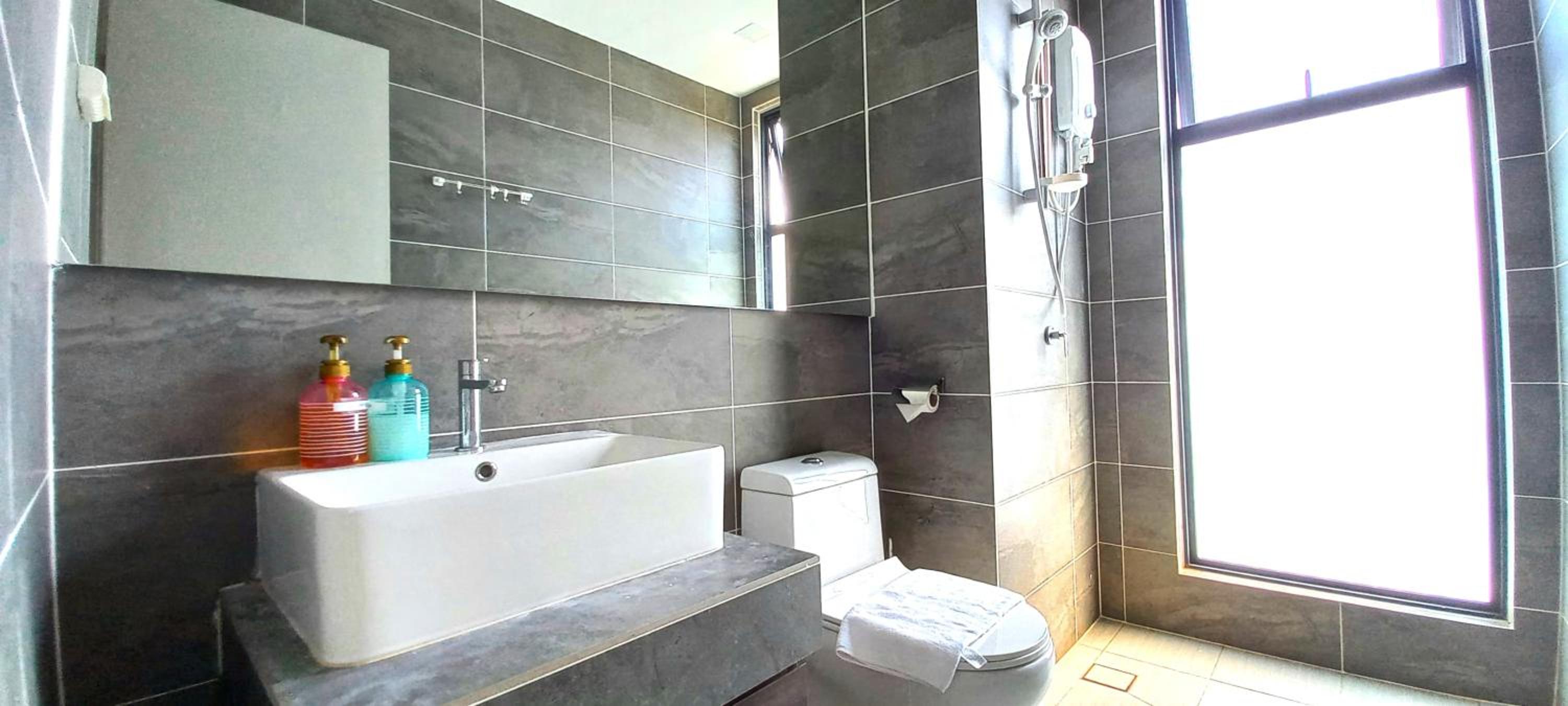 Three-Bedroom Apartment - Photo 6