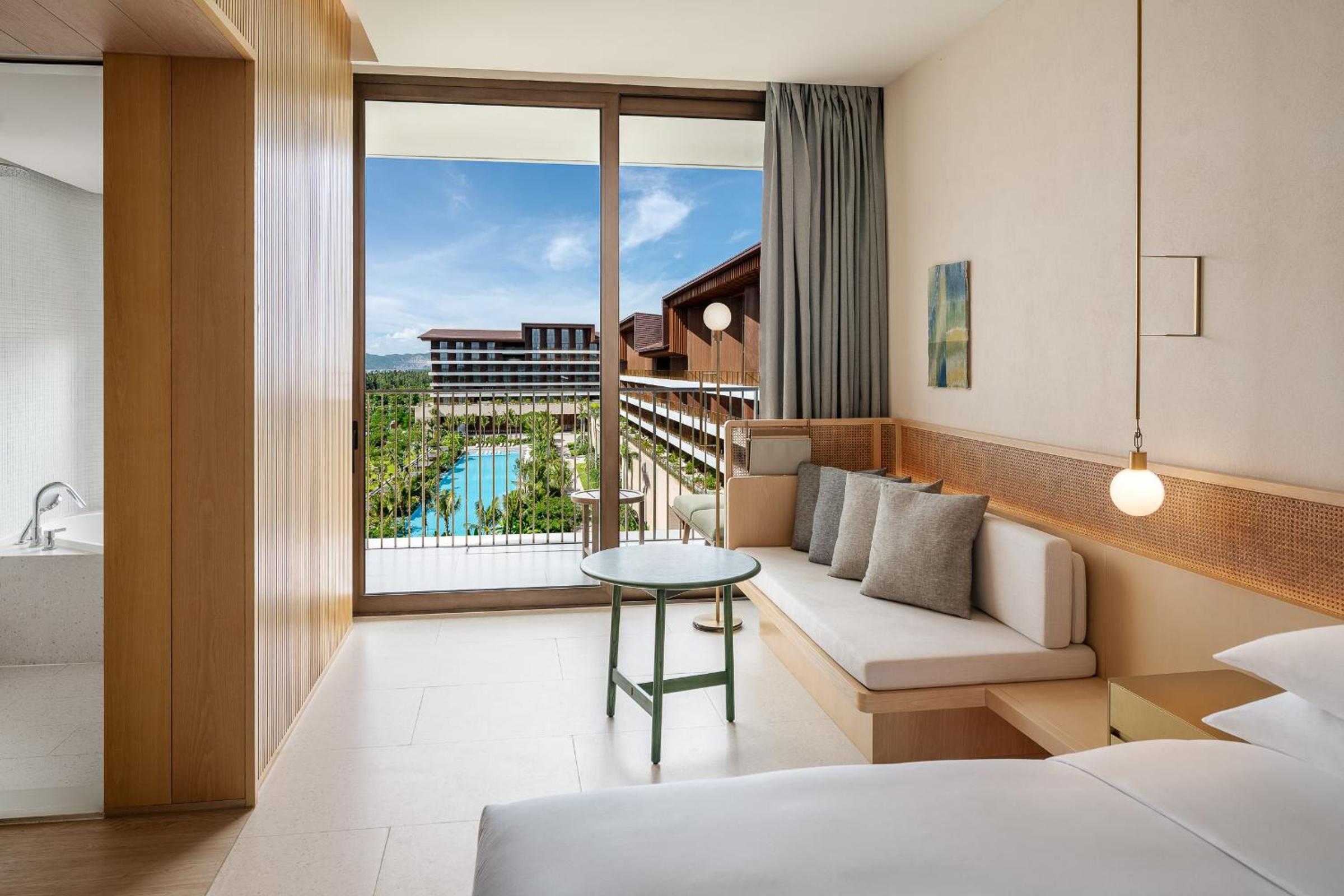Deluxe Queen Room with Two Queen Beds and Balcony - Photo 1