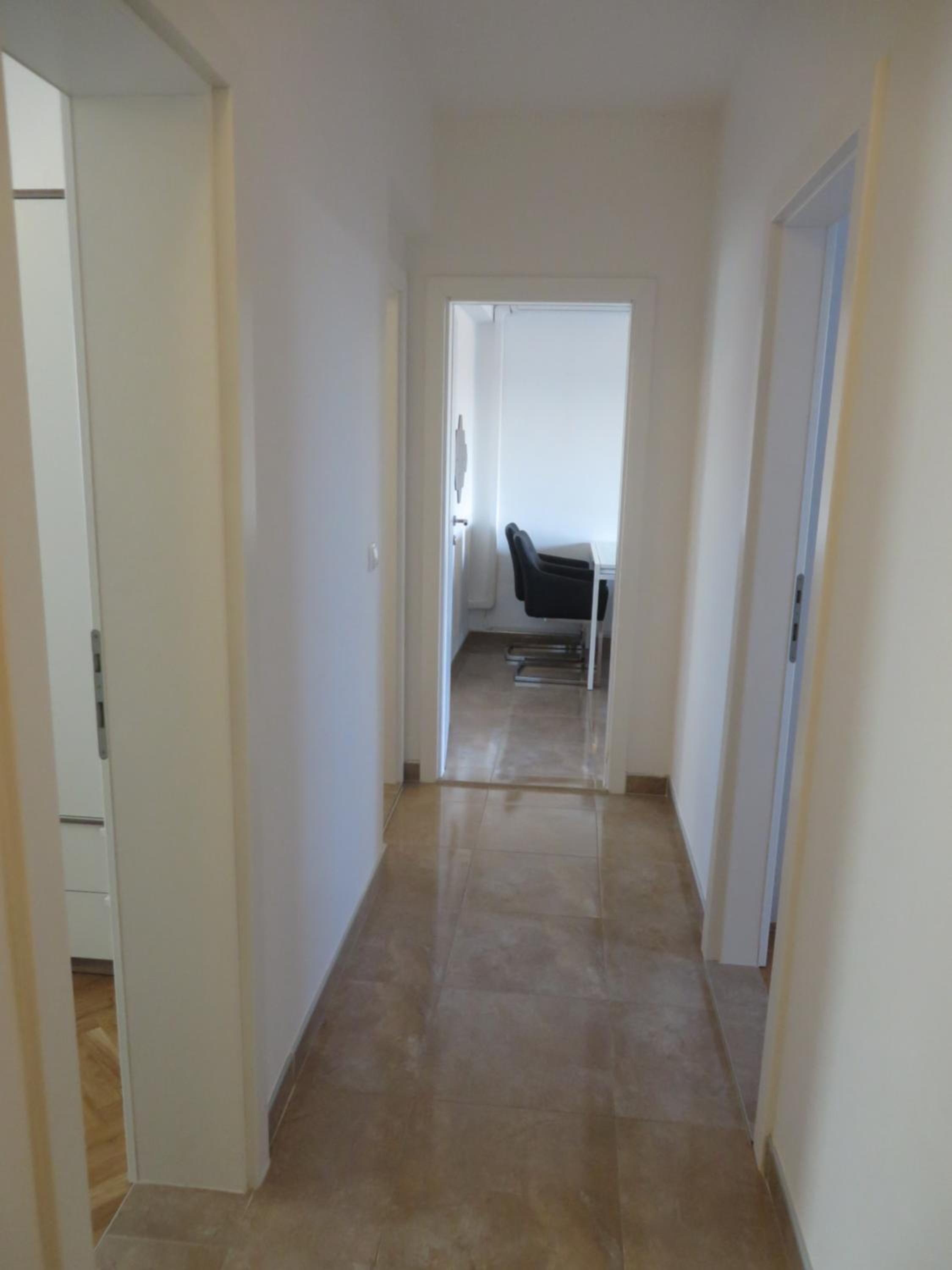 Three-Bedroom Apartment photo 1