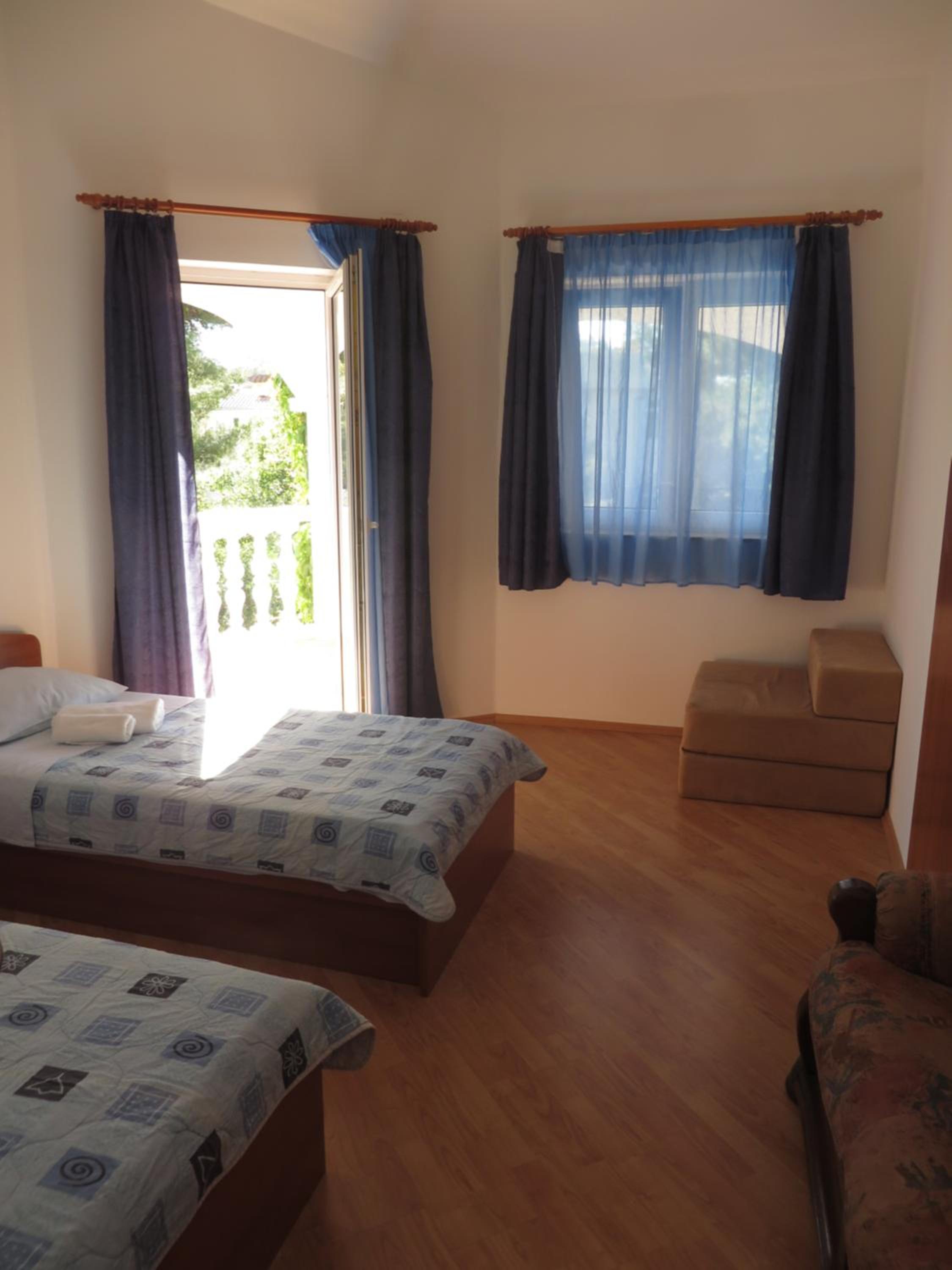 Three-Bedroom Apartment with Balcony