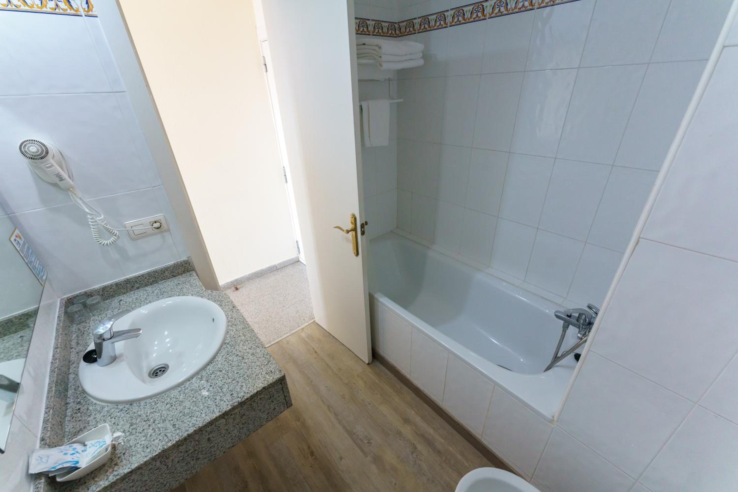Triple Room (2 Adults + 1 Child)