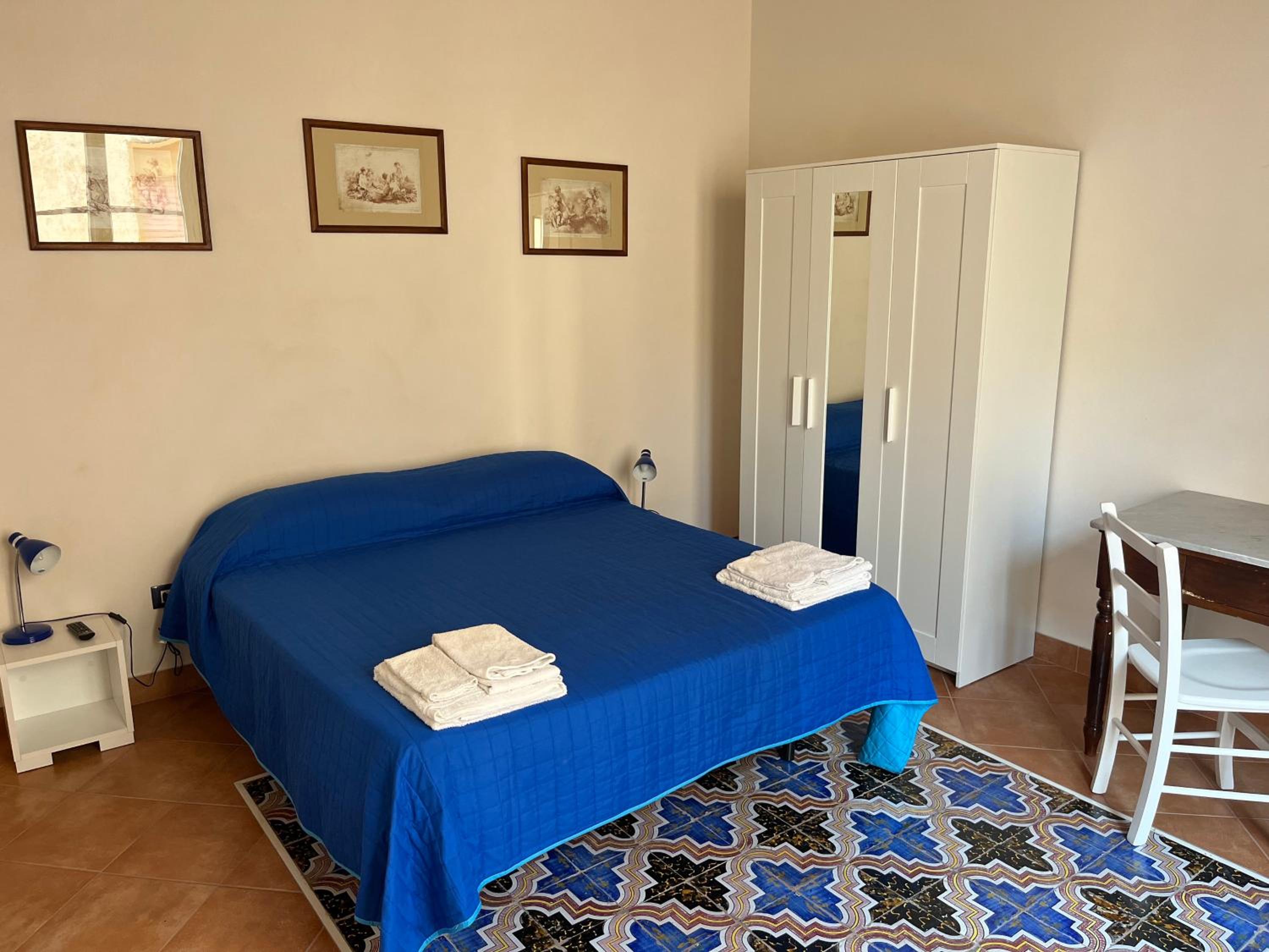 Quadruple Room with Private Bathroom