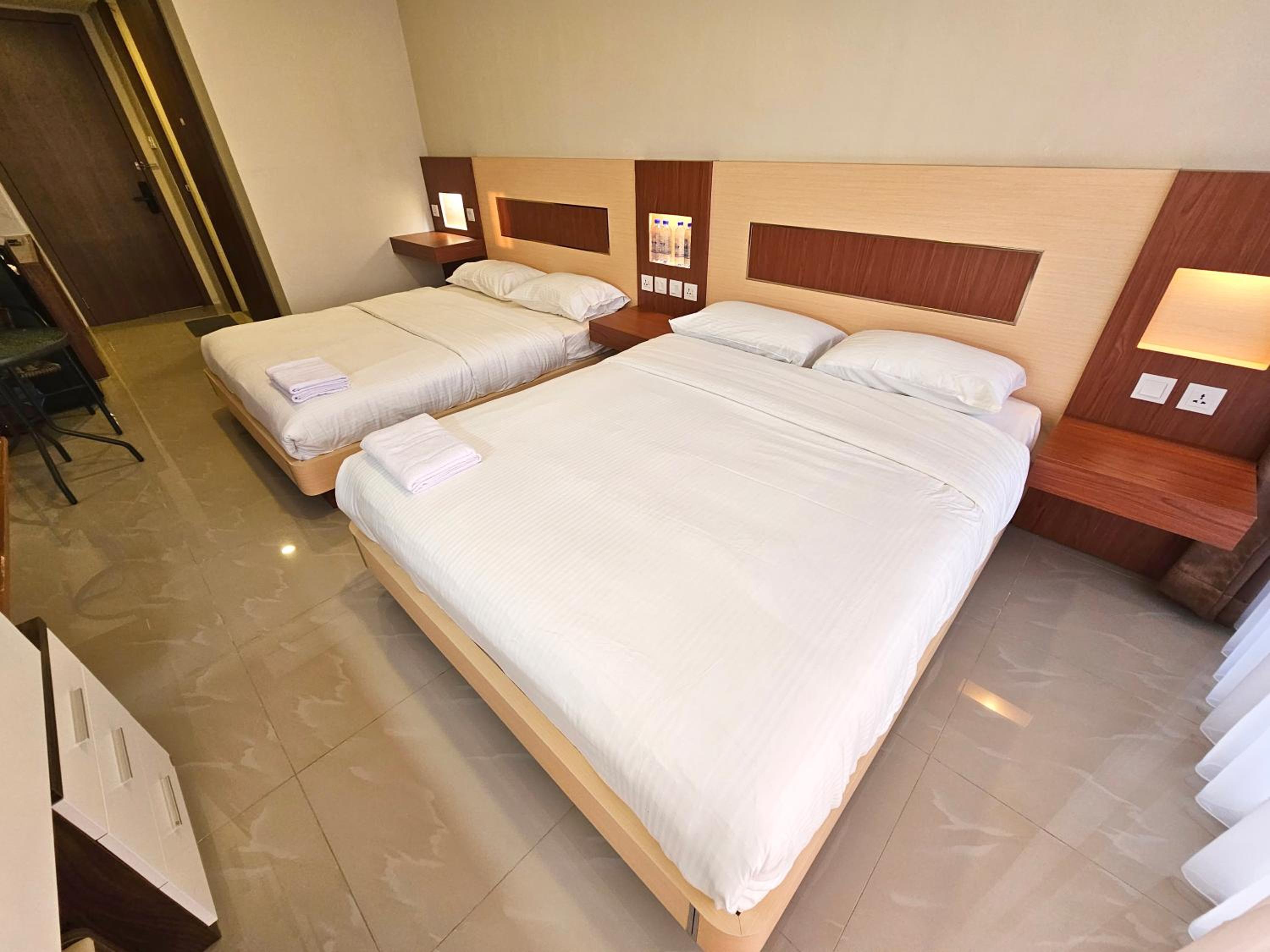 Standard Queen Room with Two Queen Beds - Photo 1