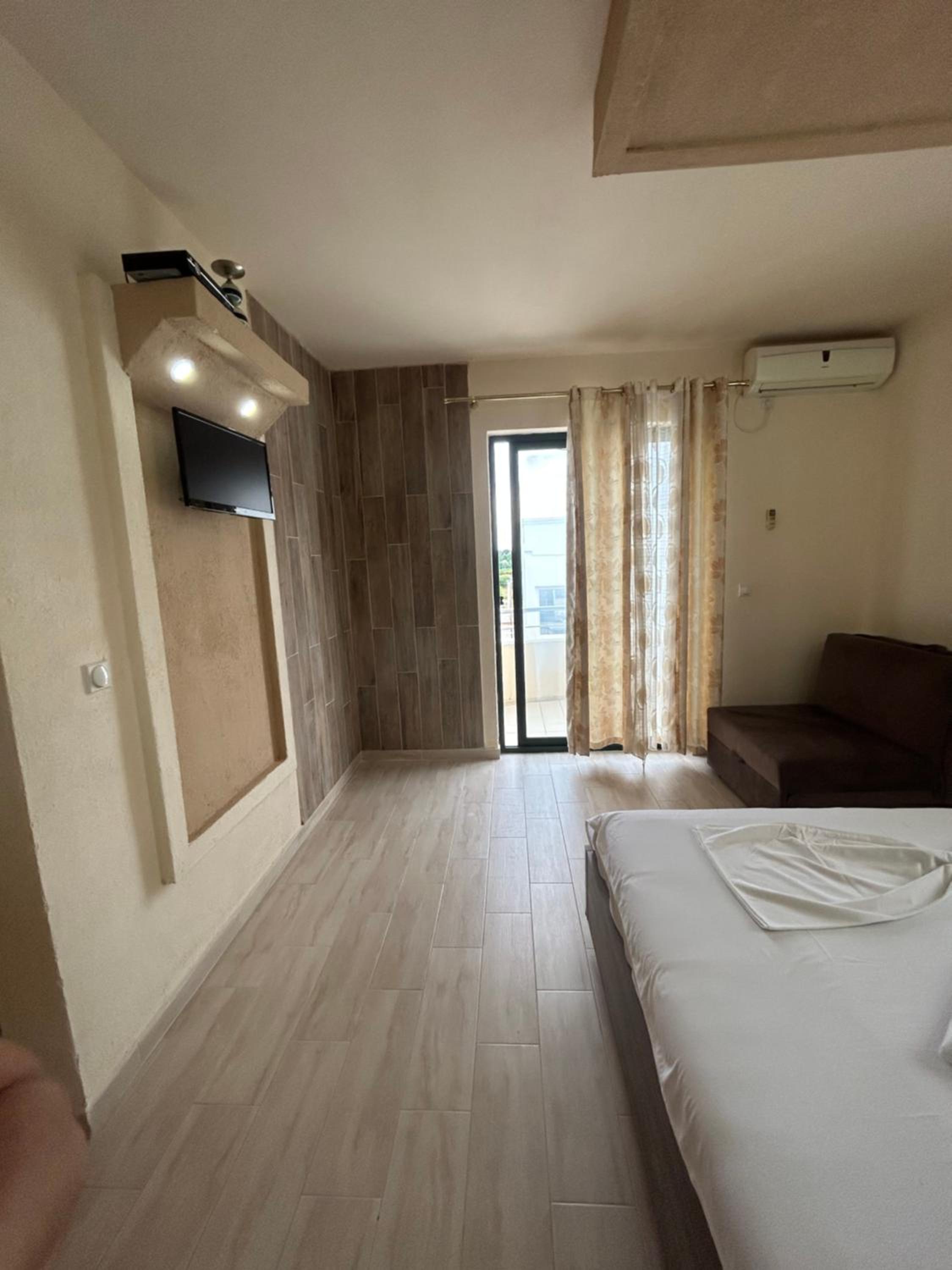 Quadruple Room with Balcony photo 3