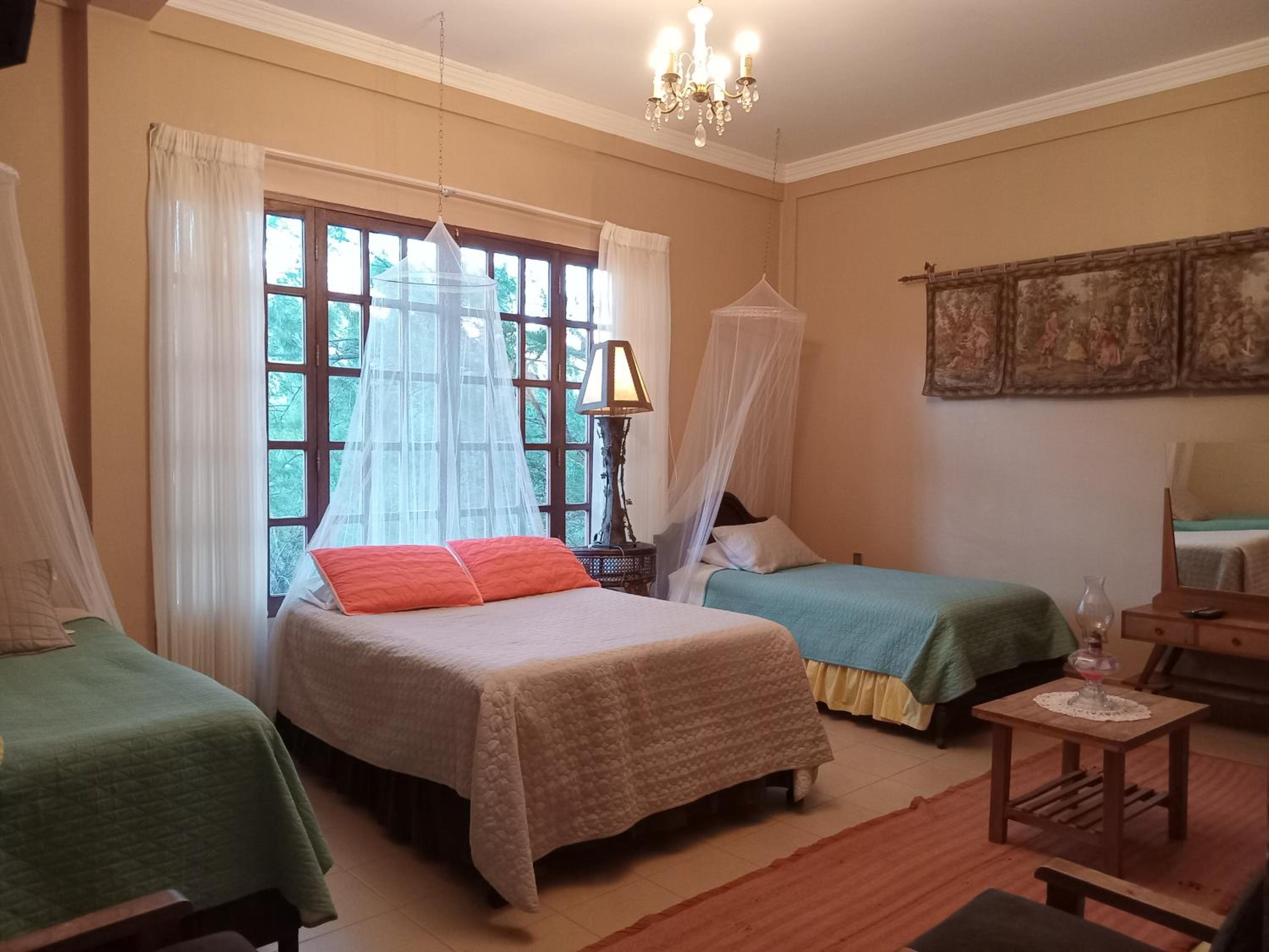 Quadruple Room with Private Bathroom