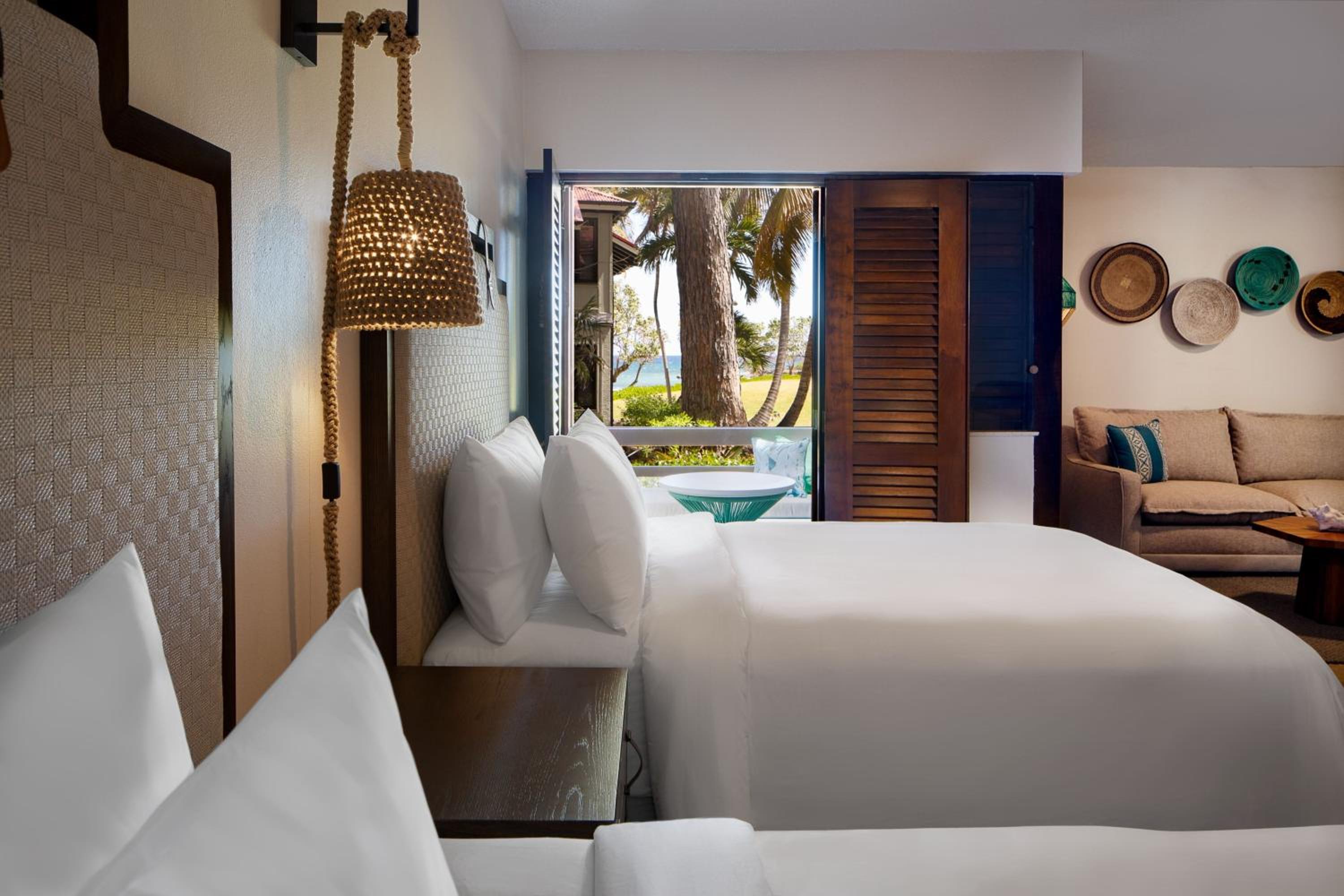 Junior Suite with Two Double Beds with Sofa Bed, Kitchenette and Ocean View photo 2