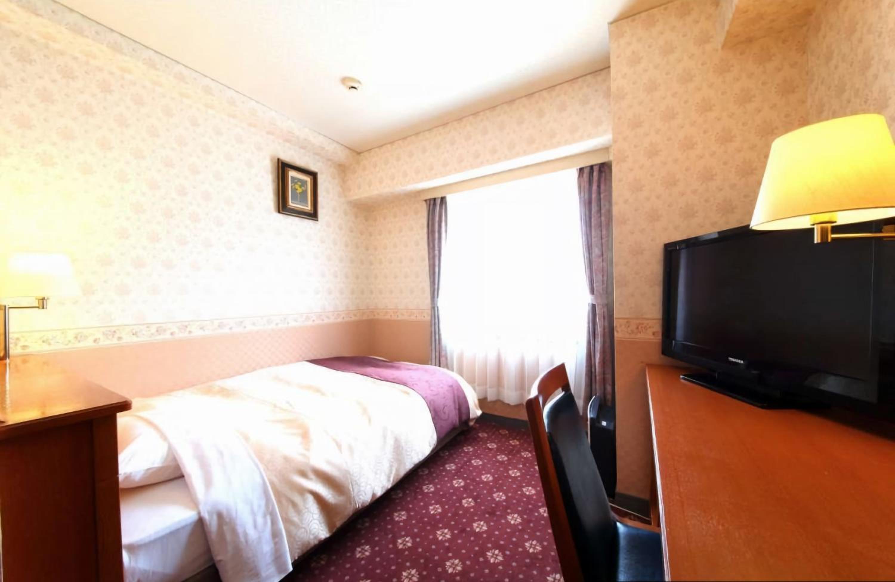Standard Single Room -Smoking - Photo 1