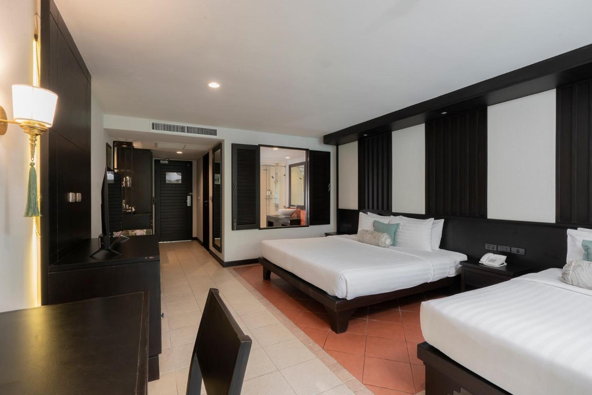 Deluxe Triple Room - Photo 14